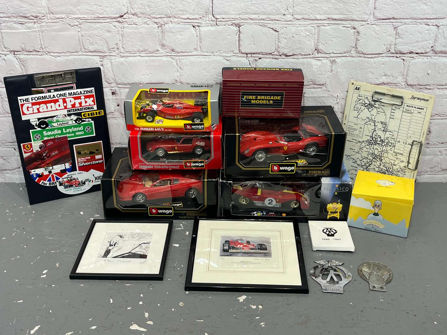 <p>Burago Boxed Ferrari Models, AA Badges Etc</p>