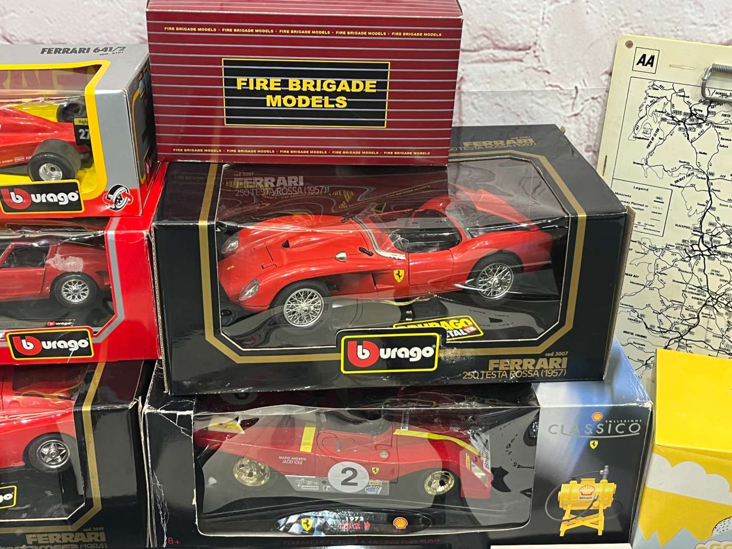 <p>Burago Boxed Ferrari Models, AA Badges Etc</p>