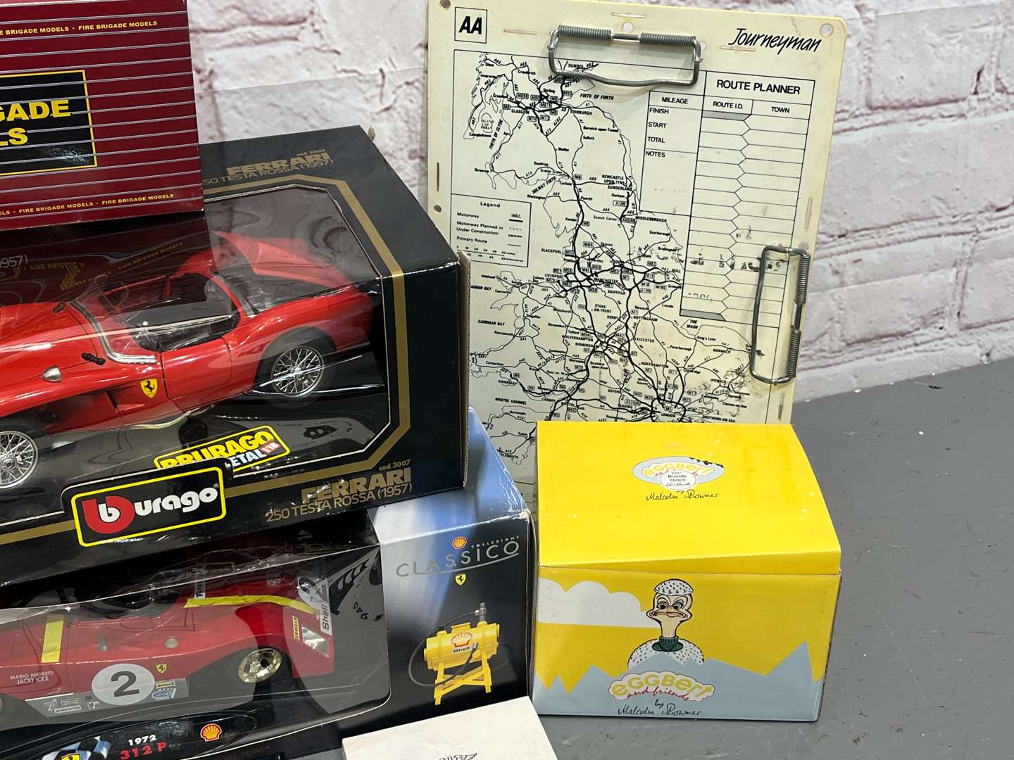 <p>Burago Boxed Ferrari Models, AA Badges Etc</p>