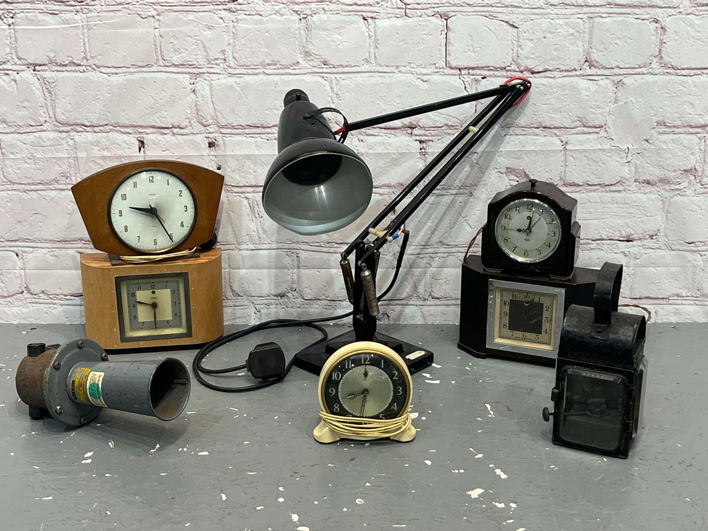 <p>Herbert Terry Angle Poise Lamp, Three Smiths Electric Clocks Etc</p>