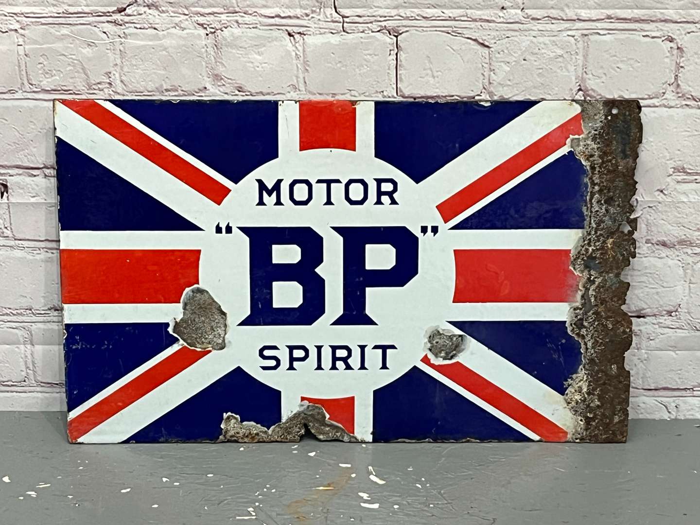 <p>Union Jack BP Motor Spirit Enamel Flange Sign</p>