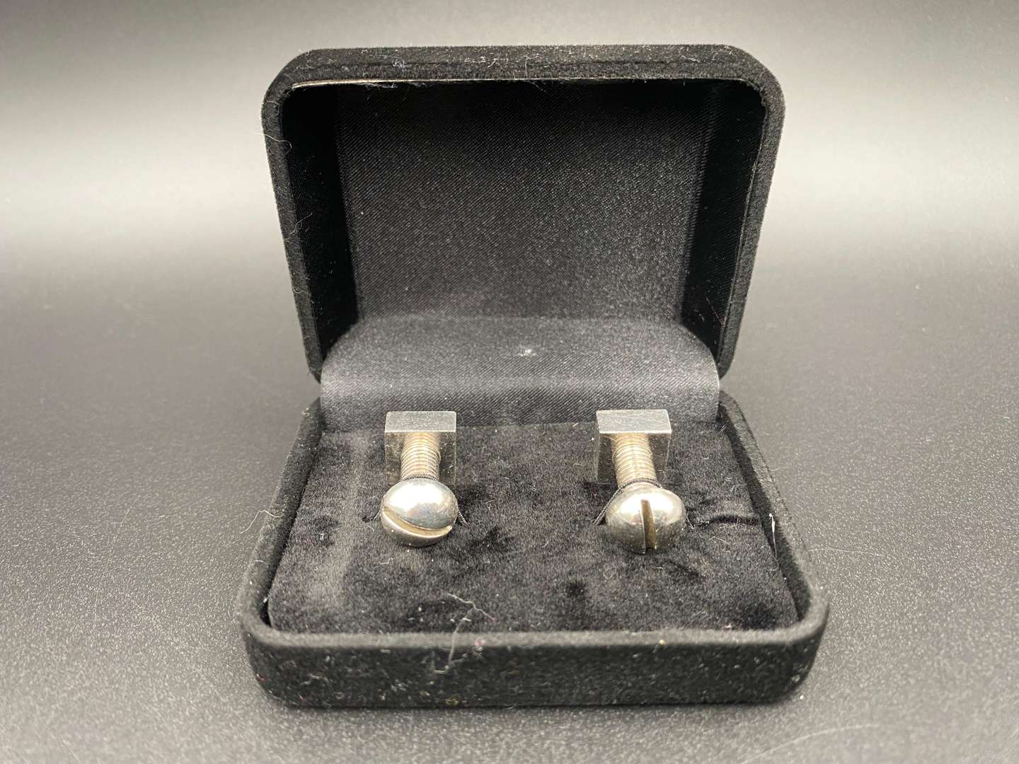 <p>NJI, A MODERN PAIR OF NUT & BOLT CUFFLINKS</p>