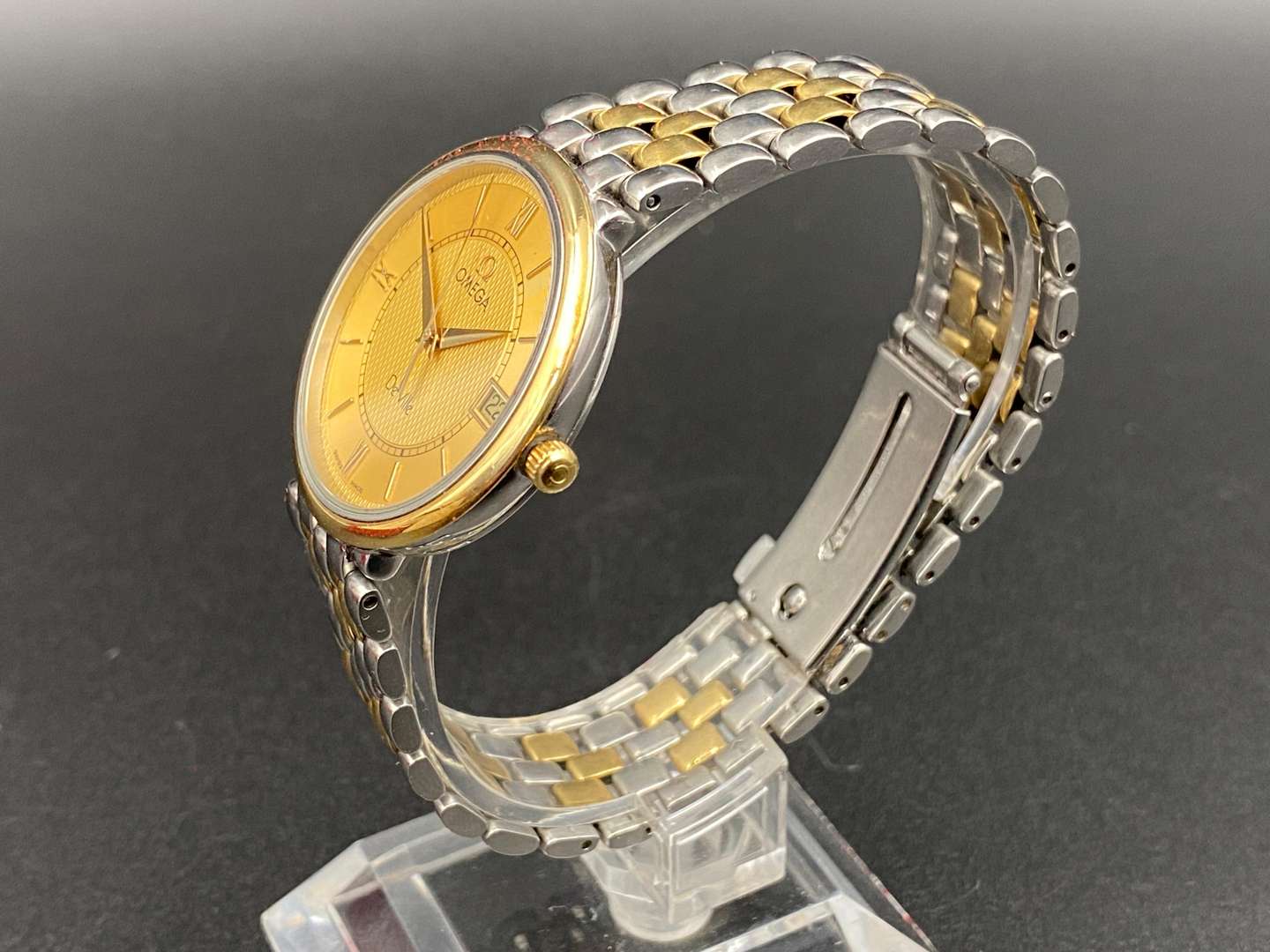 <p>OMEGA, DEVILLE, BI-METAL, QUARTZ, CENTRE SECONDS, CALENDAR, WRISTWATCH</p>