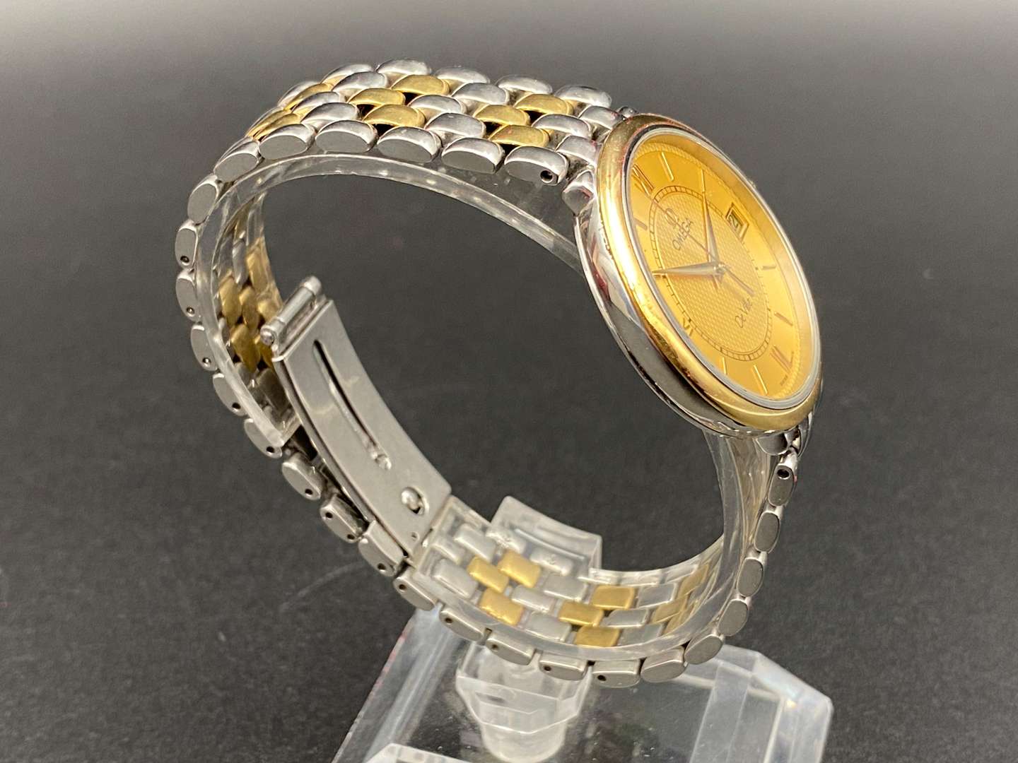 <p>OMEGA, DEVILLE, BI-METAL, QUARTZ, CENTRE SECONDS, CALENDAR, WRISTWATCH</p>