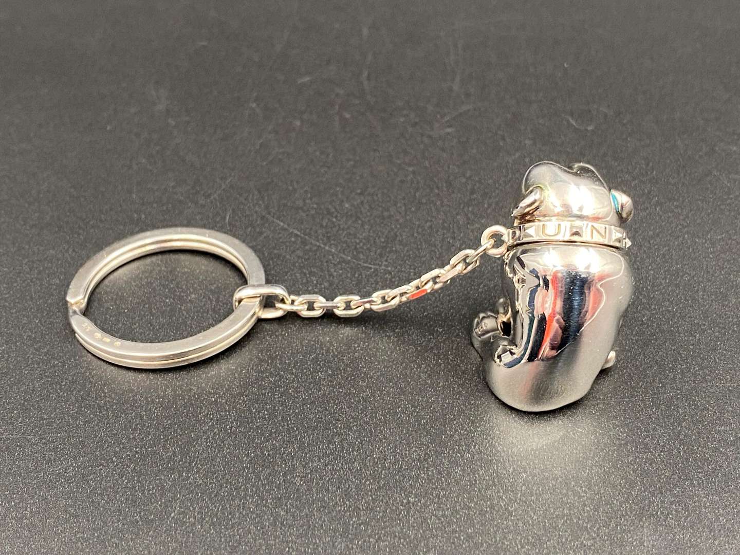 <p>DUNHILL, a Continental silver “Bulldog” key chain and fob,</p>