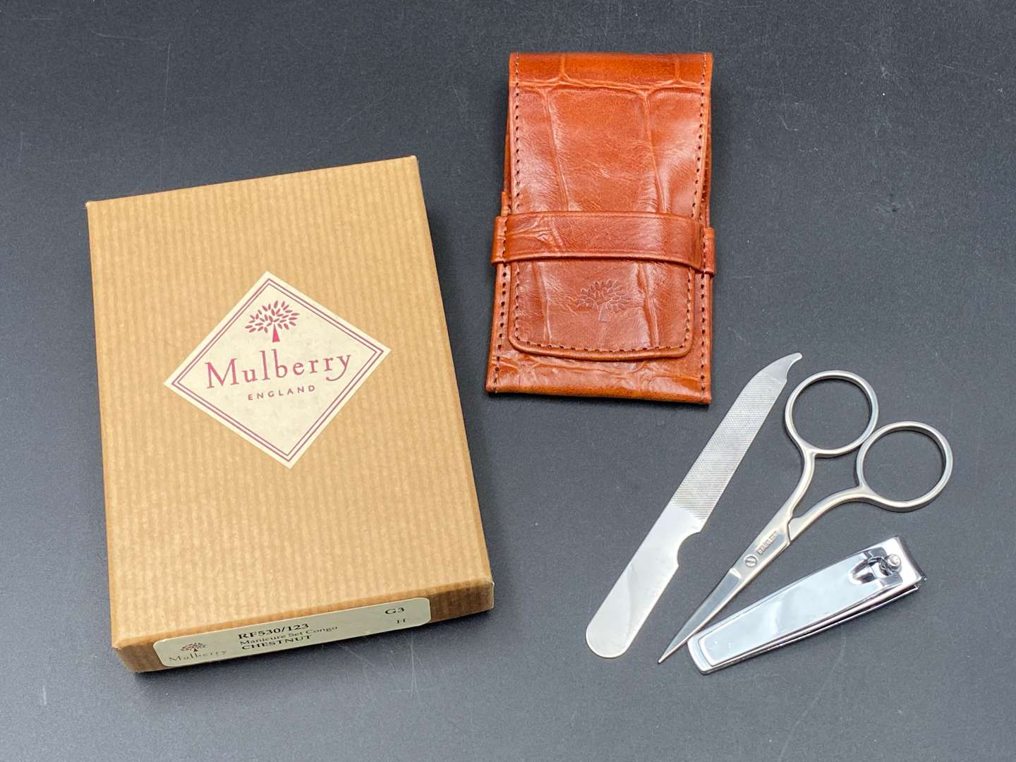 <p>MULBERRY, LEATHER PURSE AND MANICURE SET, BOXED</p>
