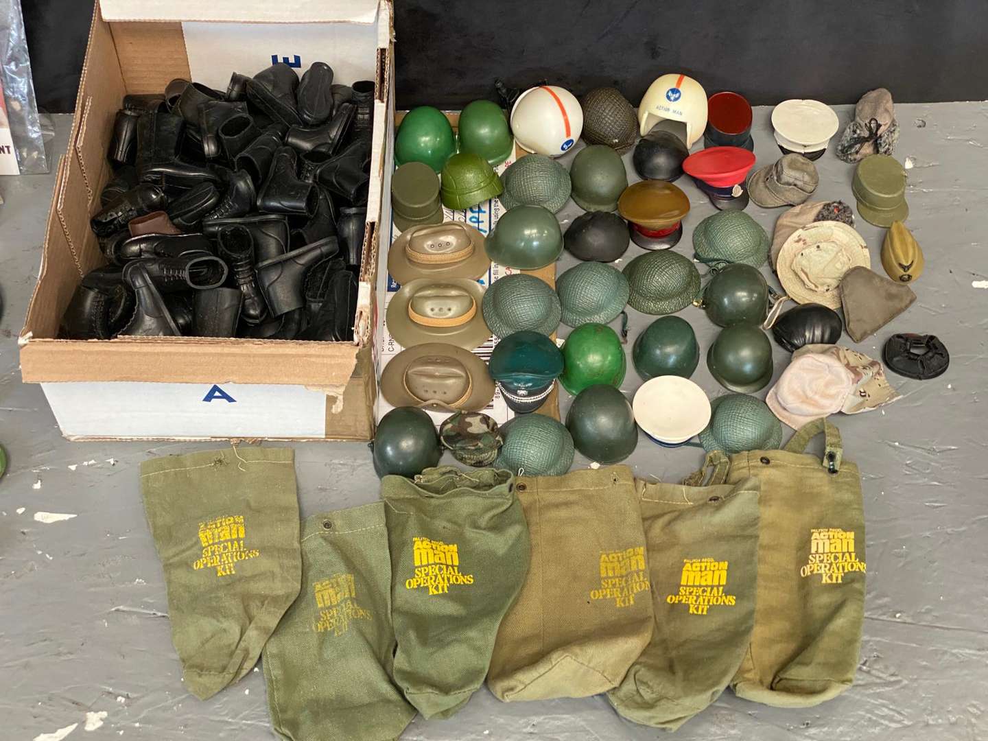 <p>ACTION MAN, GI JOE, MIXED LOT OF VINTAGE UNIFORMS, WEAPONS AND ACCESSORIES</p>