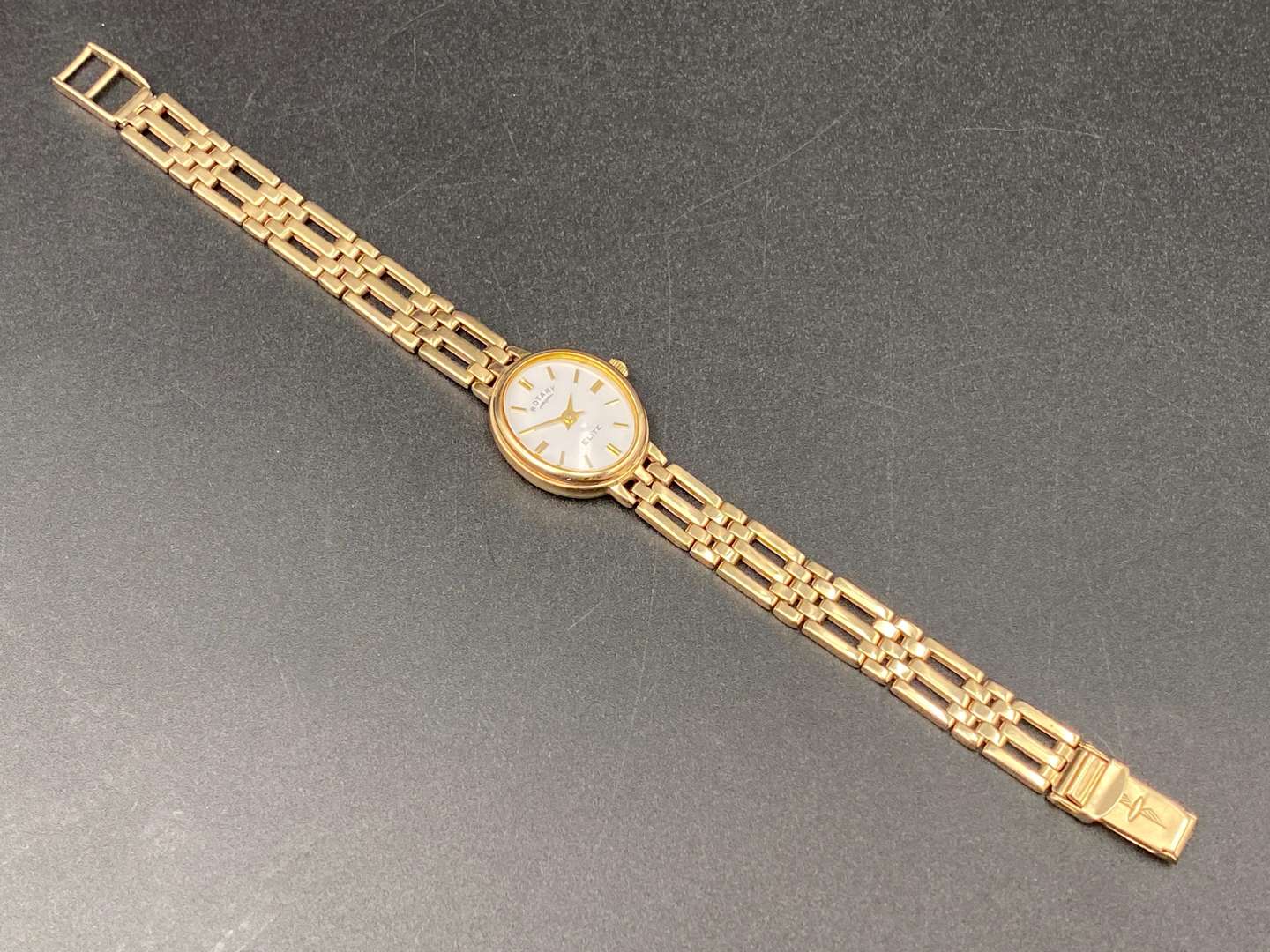 <p>ROTARY 9CT GOLD WRISTWATCH AND BOX</p>