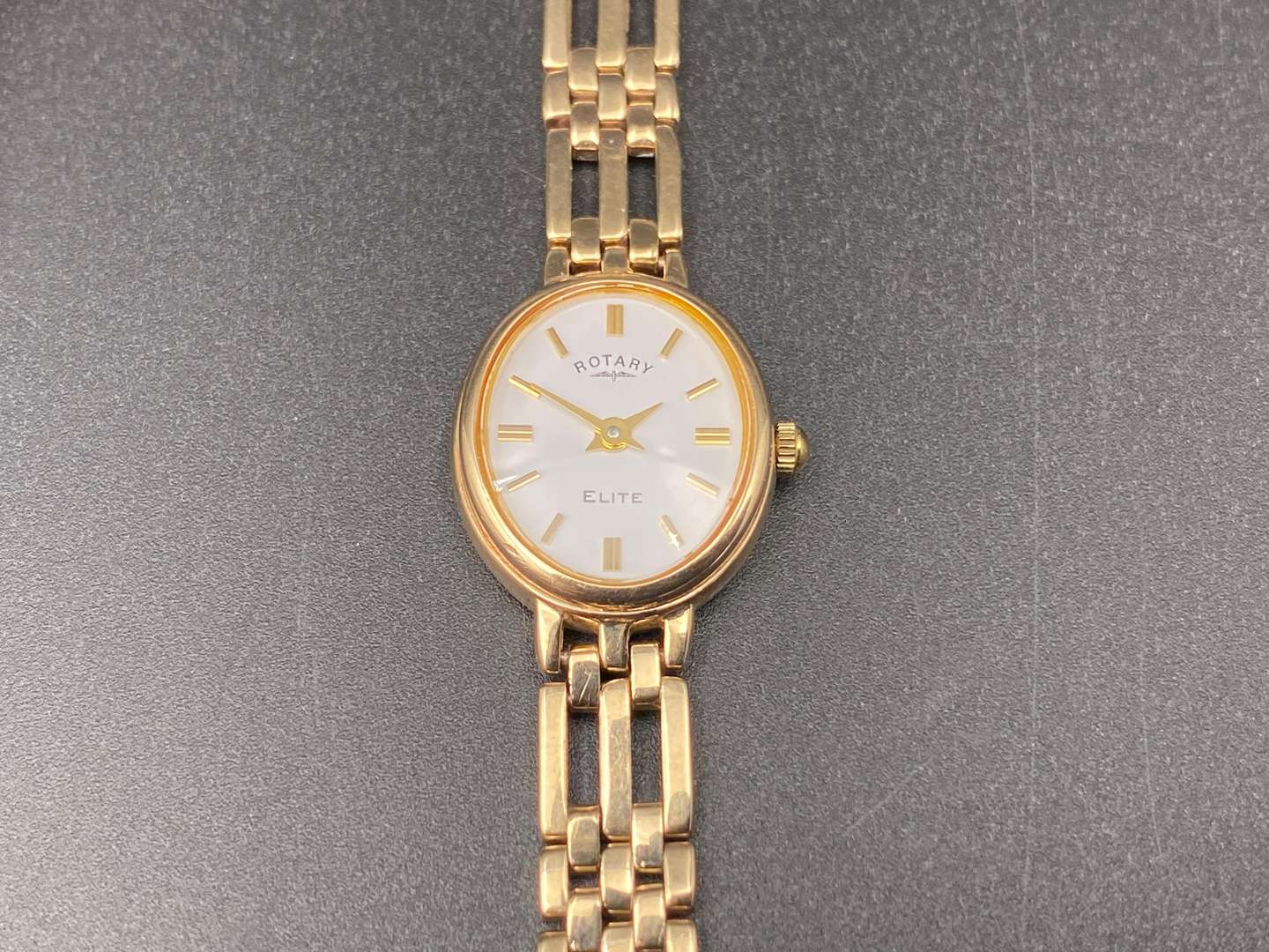 <p>ROTARY 9CT GOLD WRISTWATCH AND BOX</p>