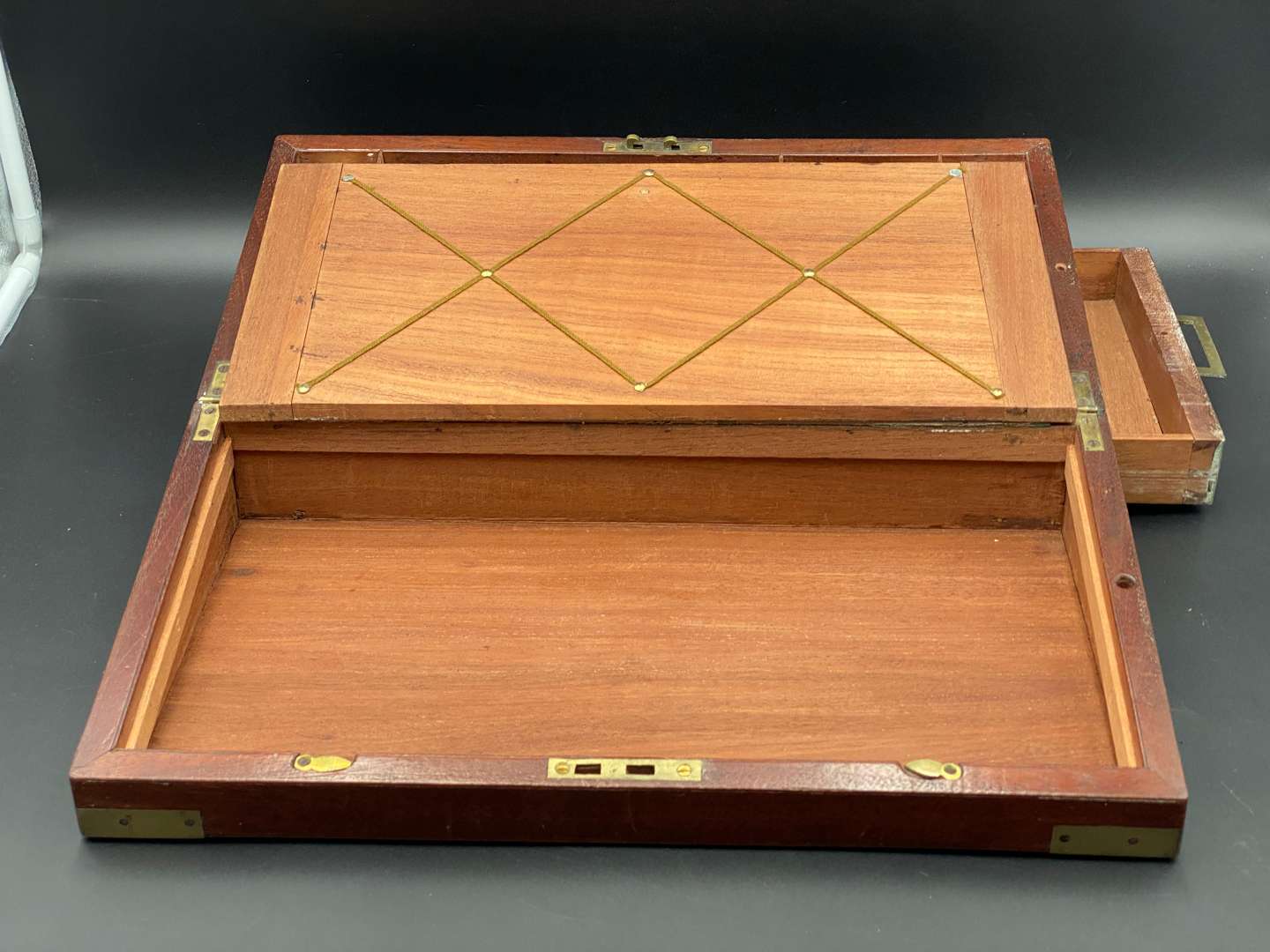 <p>MAHOGANY, BRASS BOUND WRITING SLOPE</p>