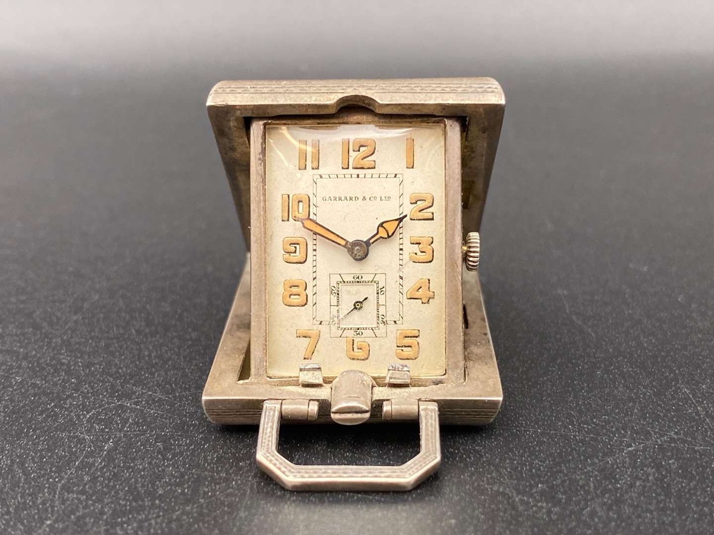 <p>GARRARD SILVER AND ENAMEL FOLDING TIMEPIECE,</p>