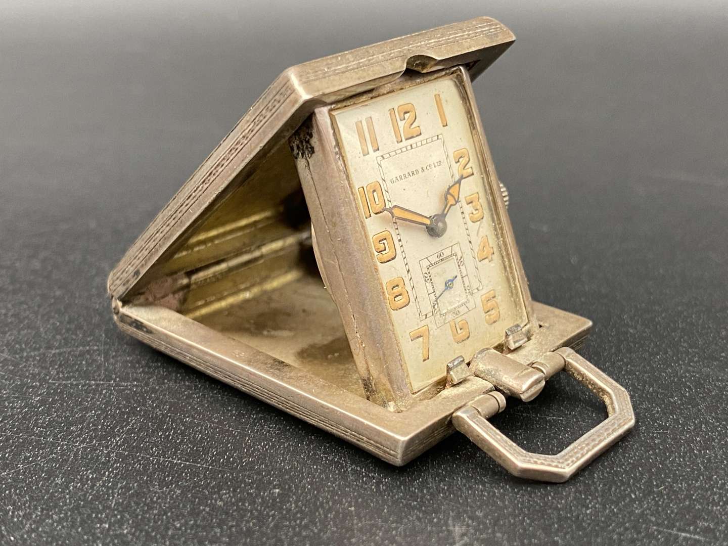 <p>GARRARD SILVER AND ENAMEL FOLDING TIMEPIECE,</p>