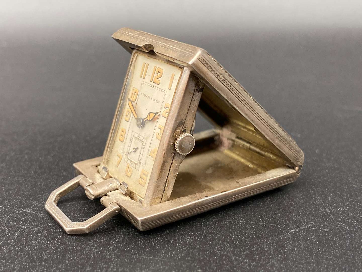 <p>GARRARD SILVER AND ENAMEL FOLDING TIMEPIECE,</p>