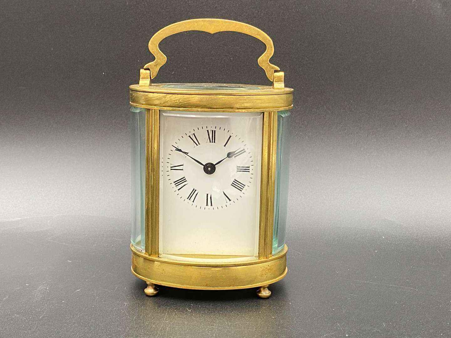 <p>EARLY 20th &nbsp;CENTURY OVAL CARRIAGE TIMEPIECE</p>
