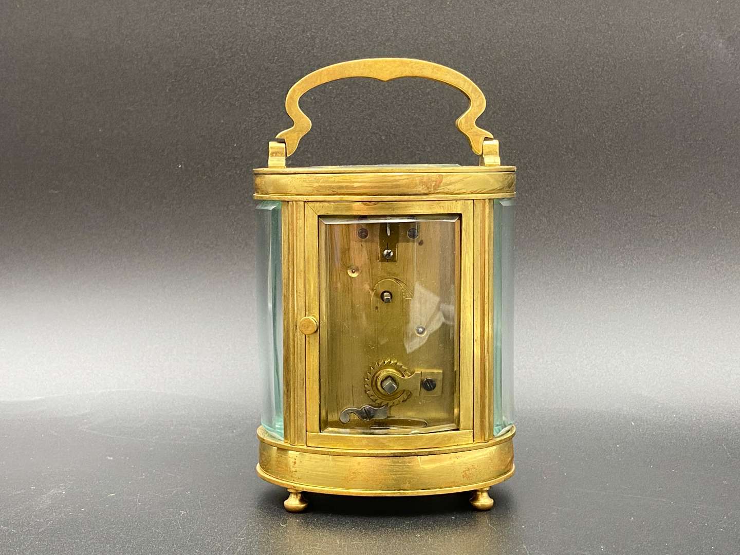 <p>EARLY 20th &nbsp;CENTURY OVAL CARRIAGE TIMEPIECE</p>