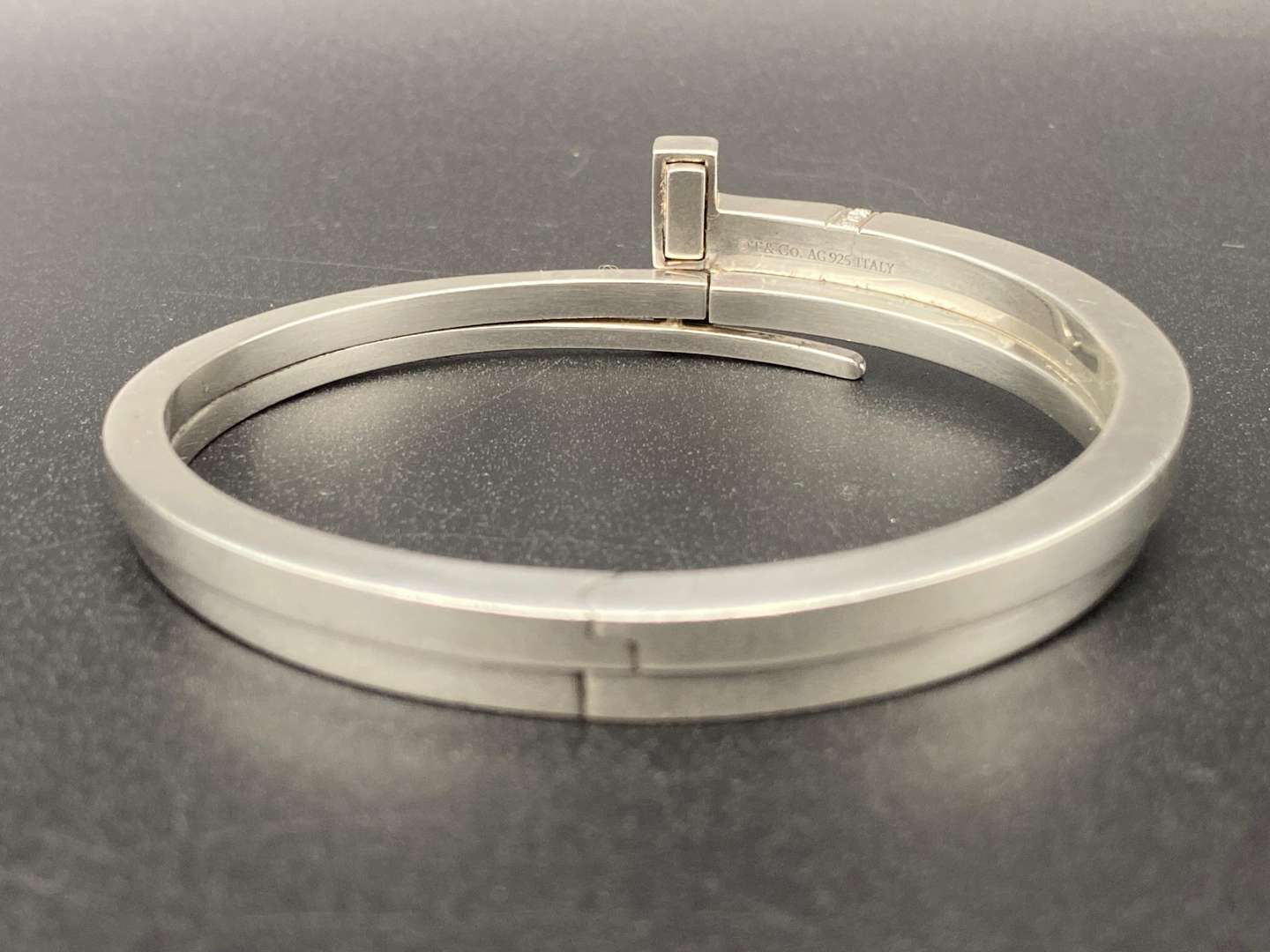 <p>TIFFANY & Co, .925 SILVER & DIAMOND T-SQUARE WRAP BRACELET</p>