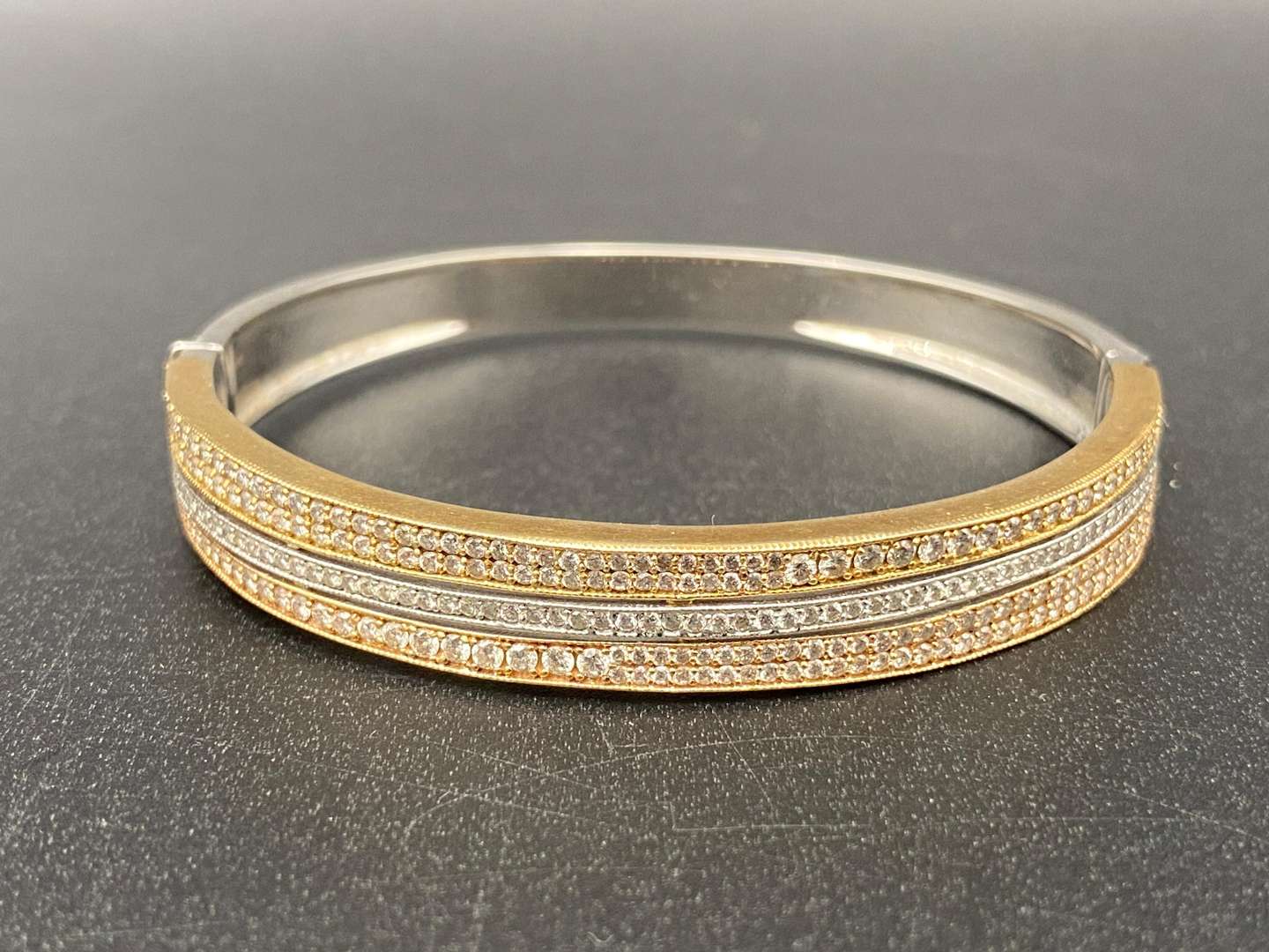 <p>TRI COLOURED GOLD AND DIAMOND BRACELET, &nbsp;3KT</p>
