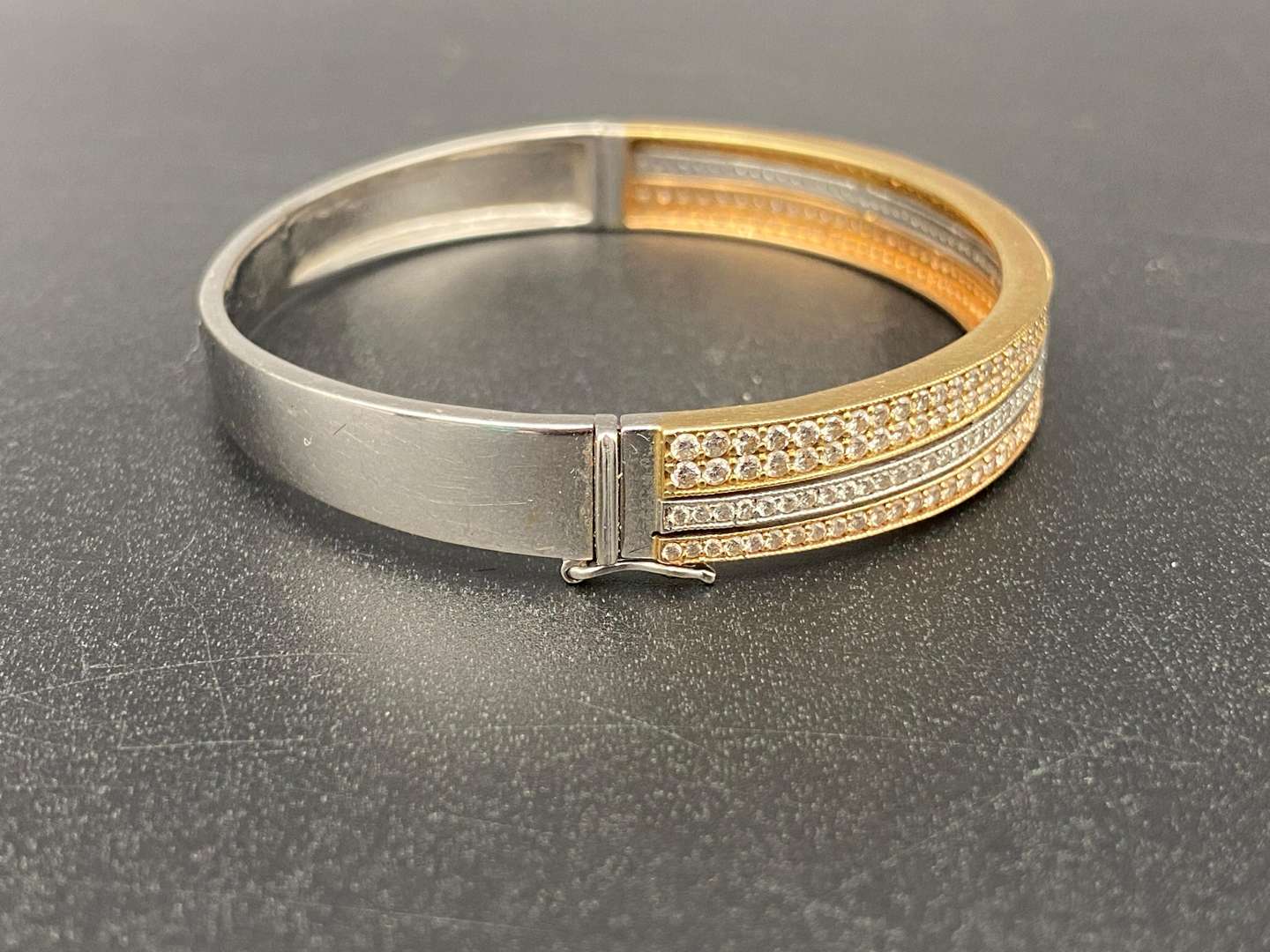 <p>TRI COLOURED GOLD AND DIAMOND BRACELET, &nbsp;3KT</p>