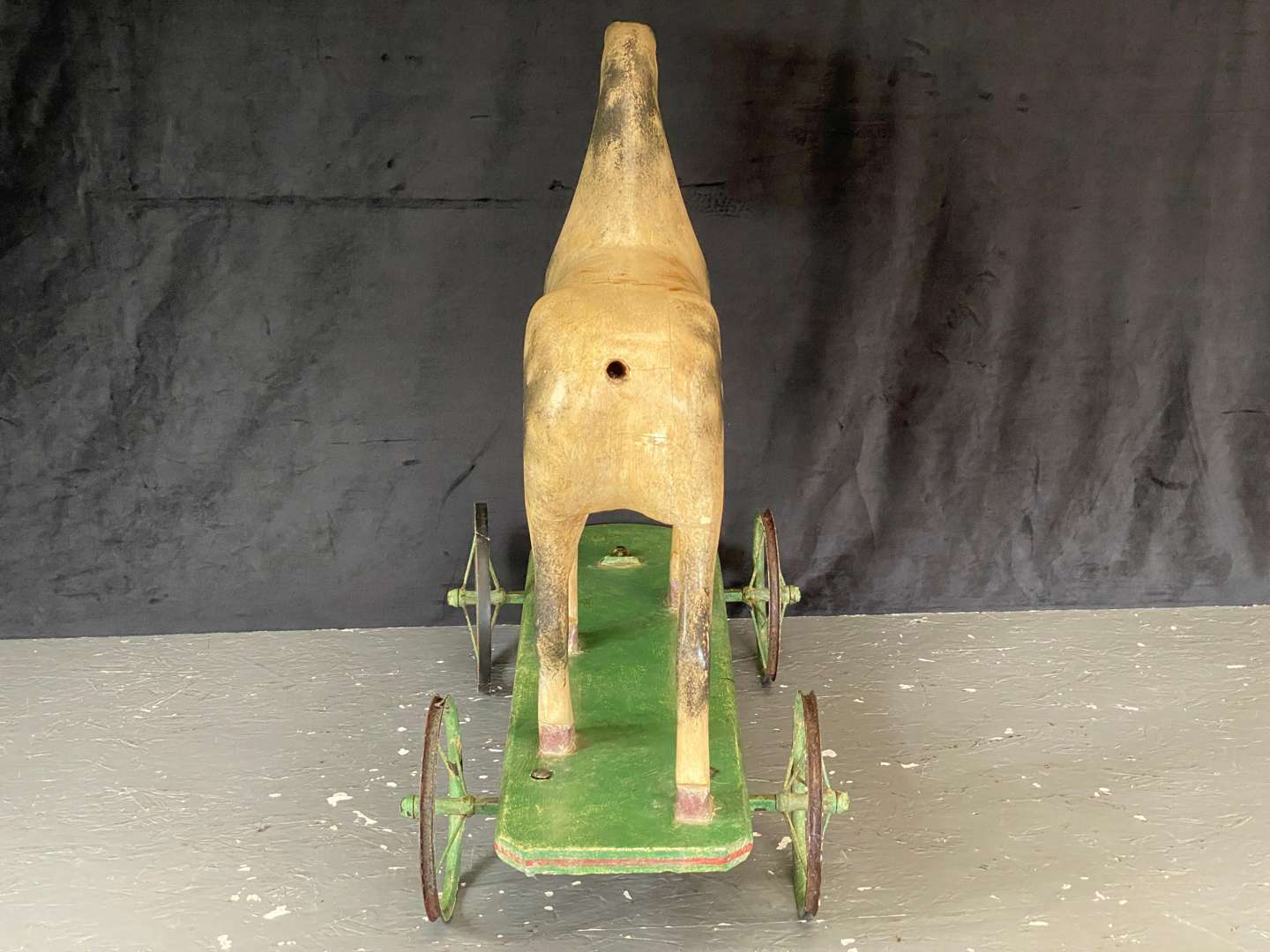 <p>EARLY 20th CENTURY, PULL ALONG PAINTED WOODEN TOY HORSE</p>