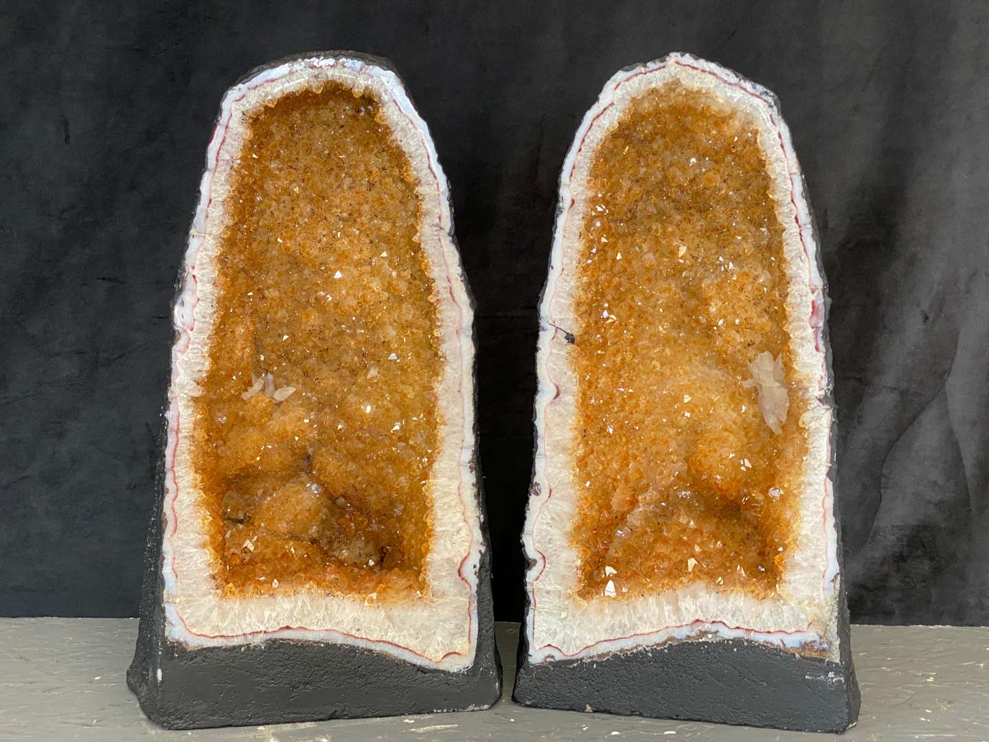 <p>MATCHED PAIR OF CATHEDERAL GEODES, CITRINE, 14.8KG EACH</p>