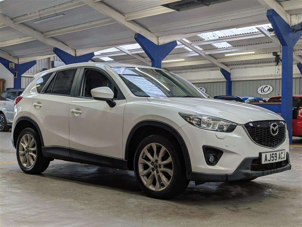 <p>2013 MAZDA CX-5 SPORT NAV D</p>