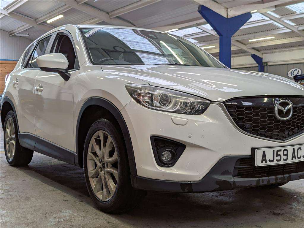 <p>2013 MAZDA CX-5 SPORT NAV D</p>