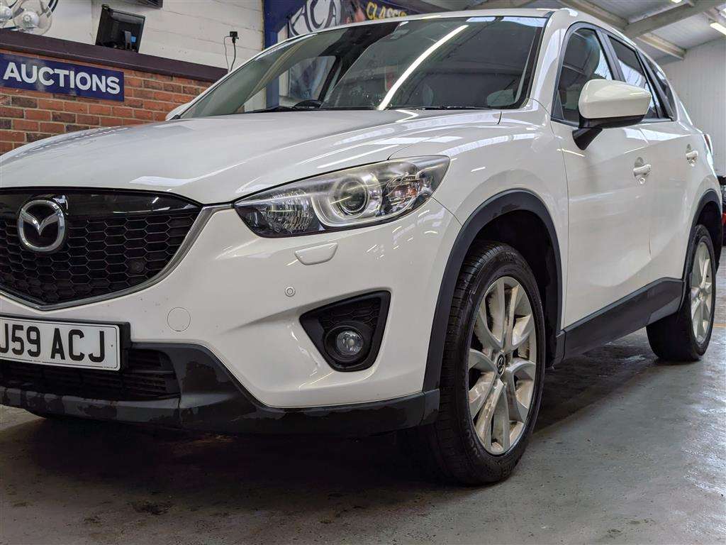 <p>2013 MAZDA CX-5 SPORT NAV D</p>