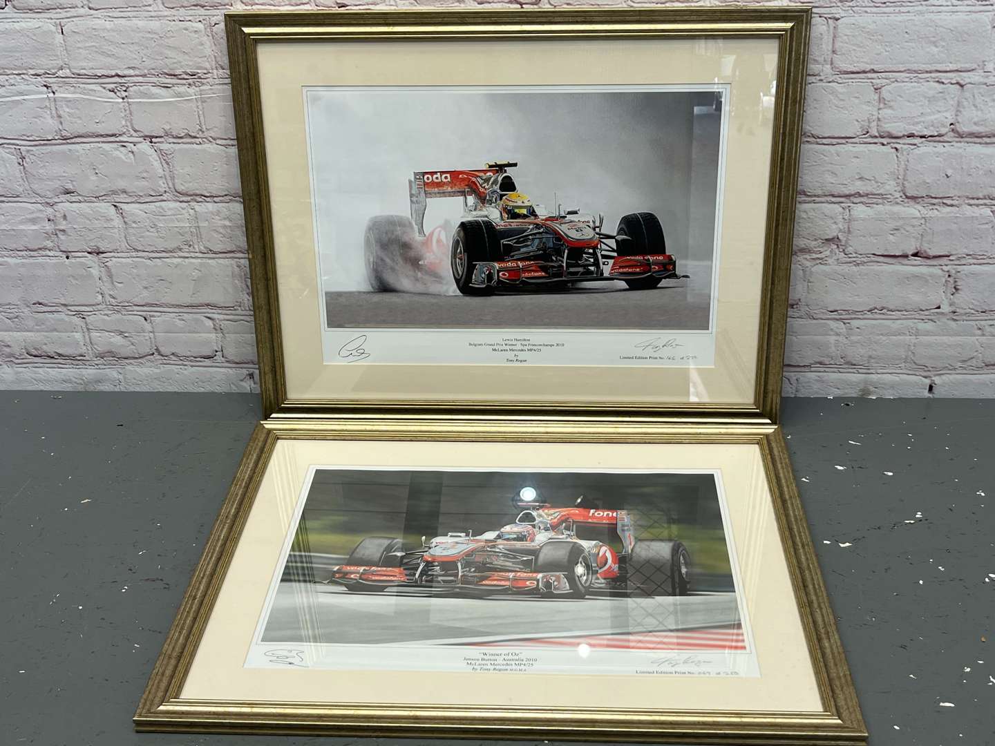 <p>Two Framed F1 Tony Regan Signed Limited Edition Prints&nbsp;</p>