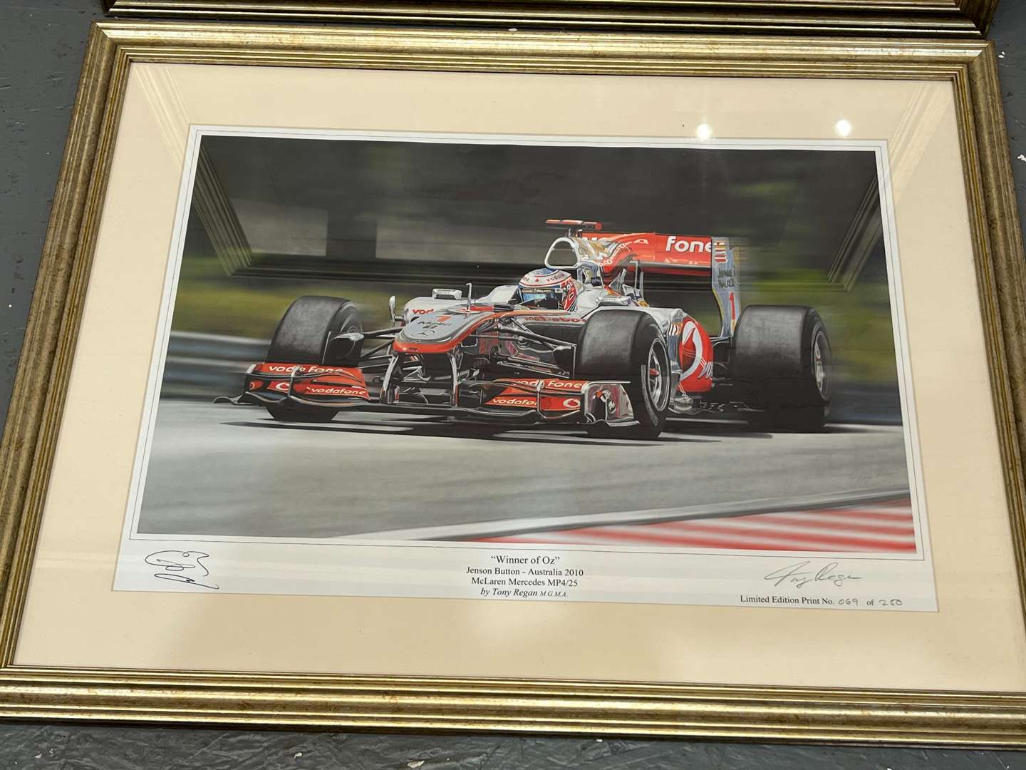 <p>Two Framed F1 Tony Regan Signed Limited Edition Prints&nbsp;</p>