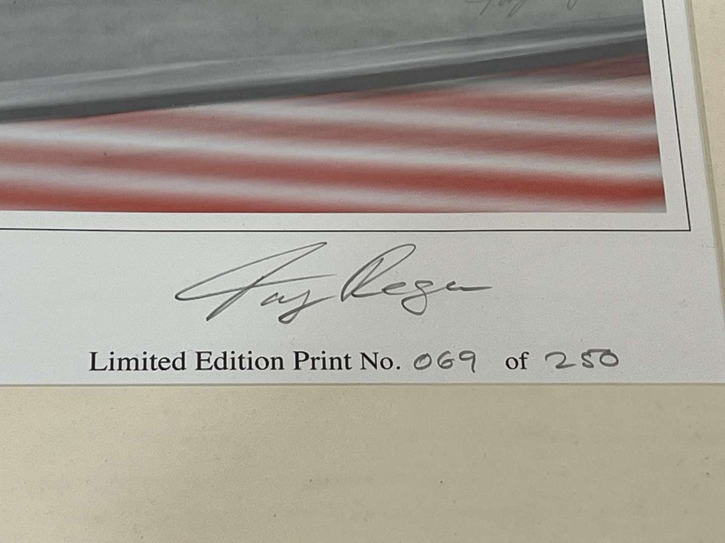 <p>Two Framed F1 Tony Regan Signed Limited Edition Prints&nbsp;</p>