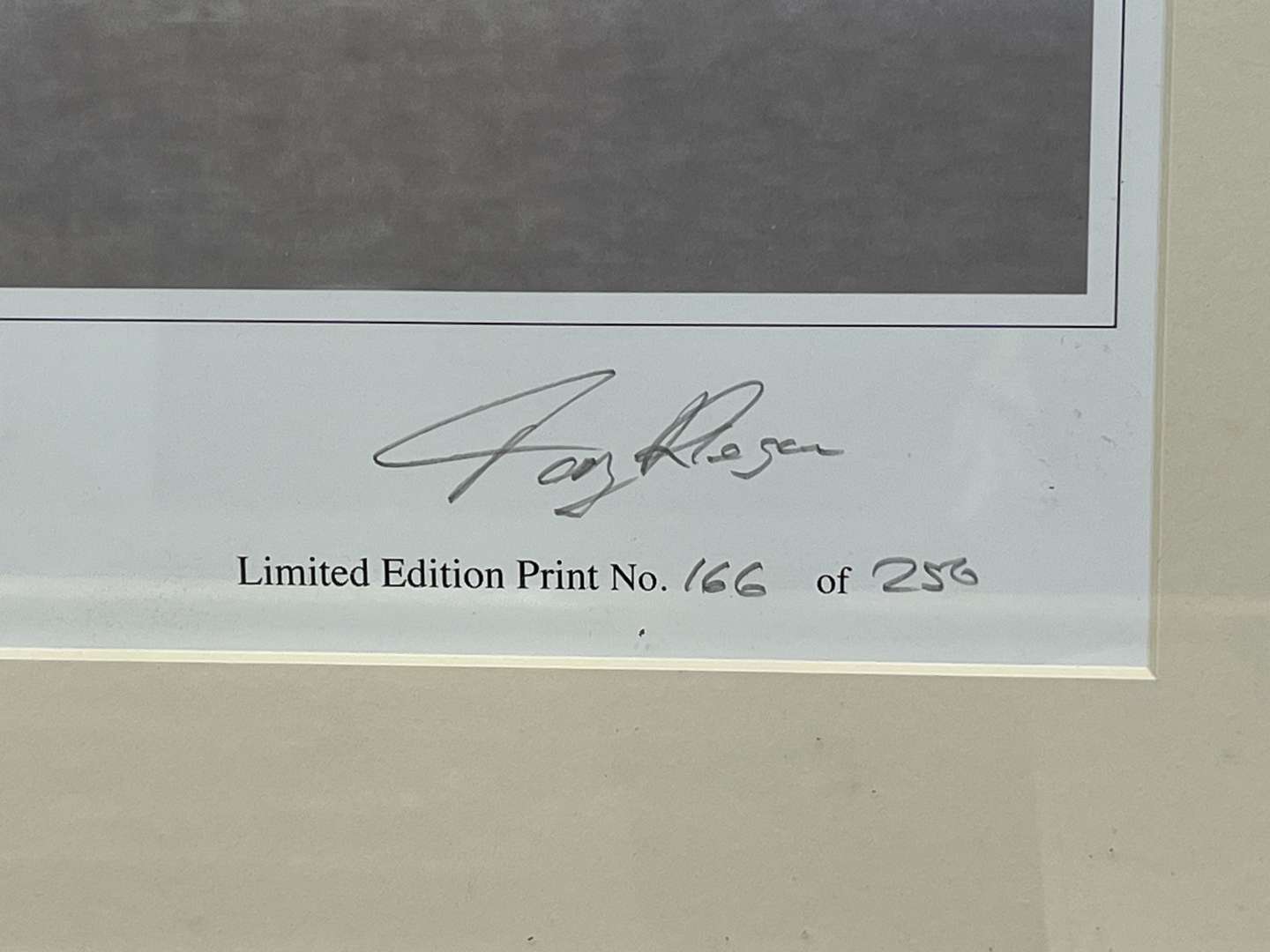 <p>Two Framed F1 Tony Regan Signed Limited Edition Prints&nbsp;</p>