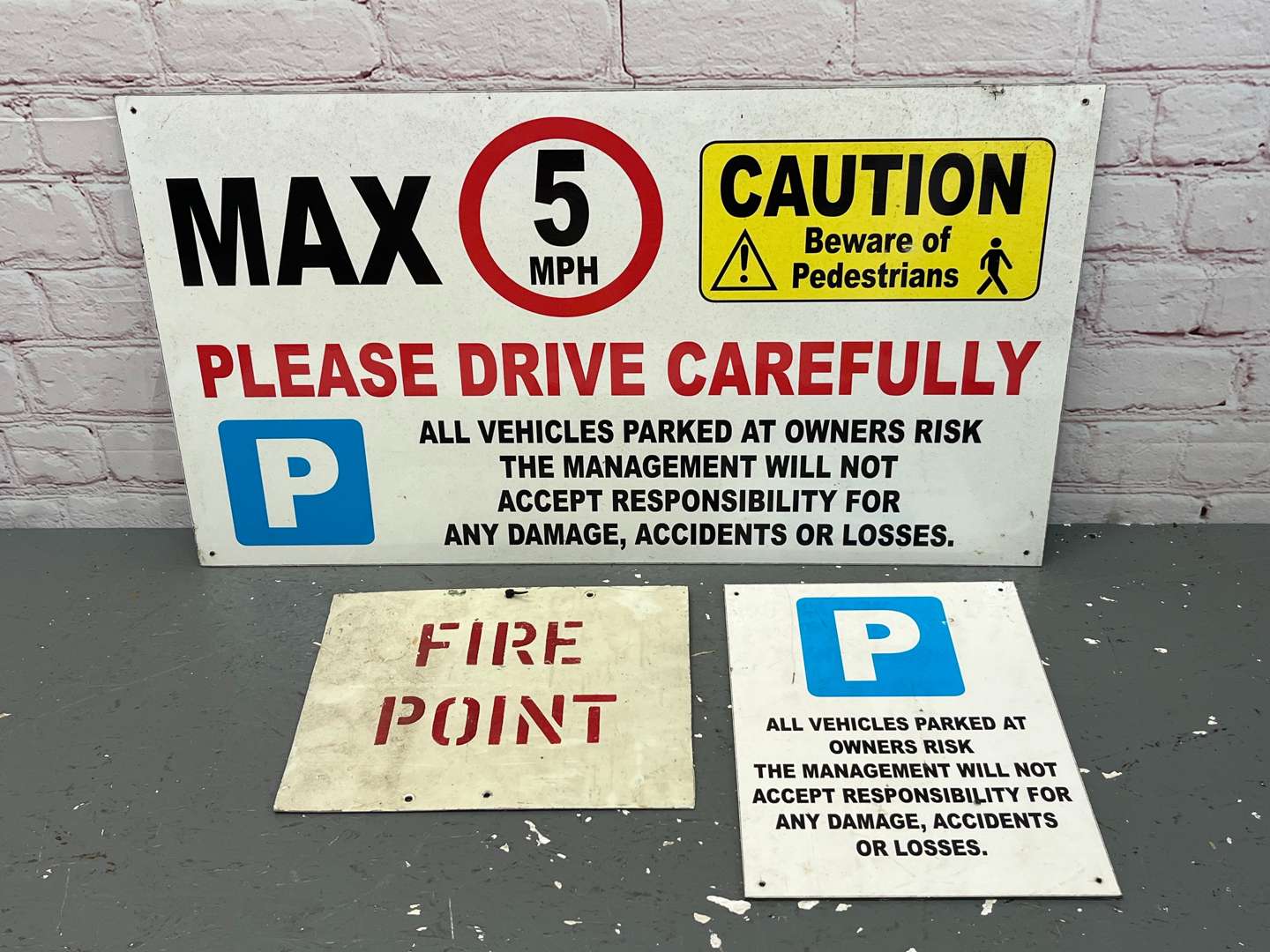 <p>Three Warning Signs On Metal Board</p>