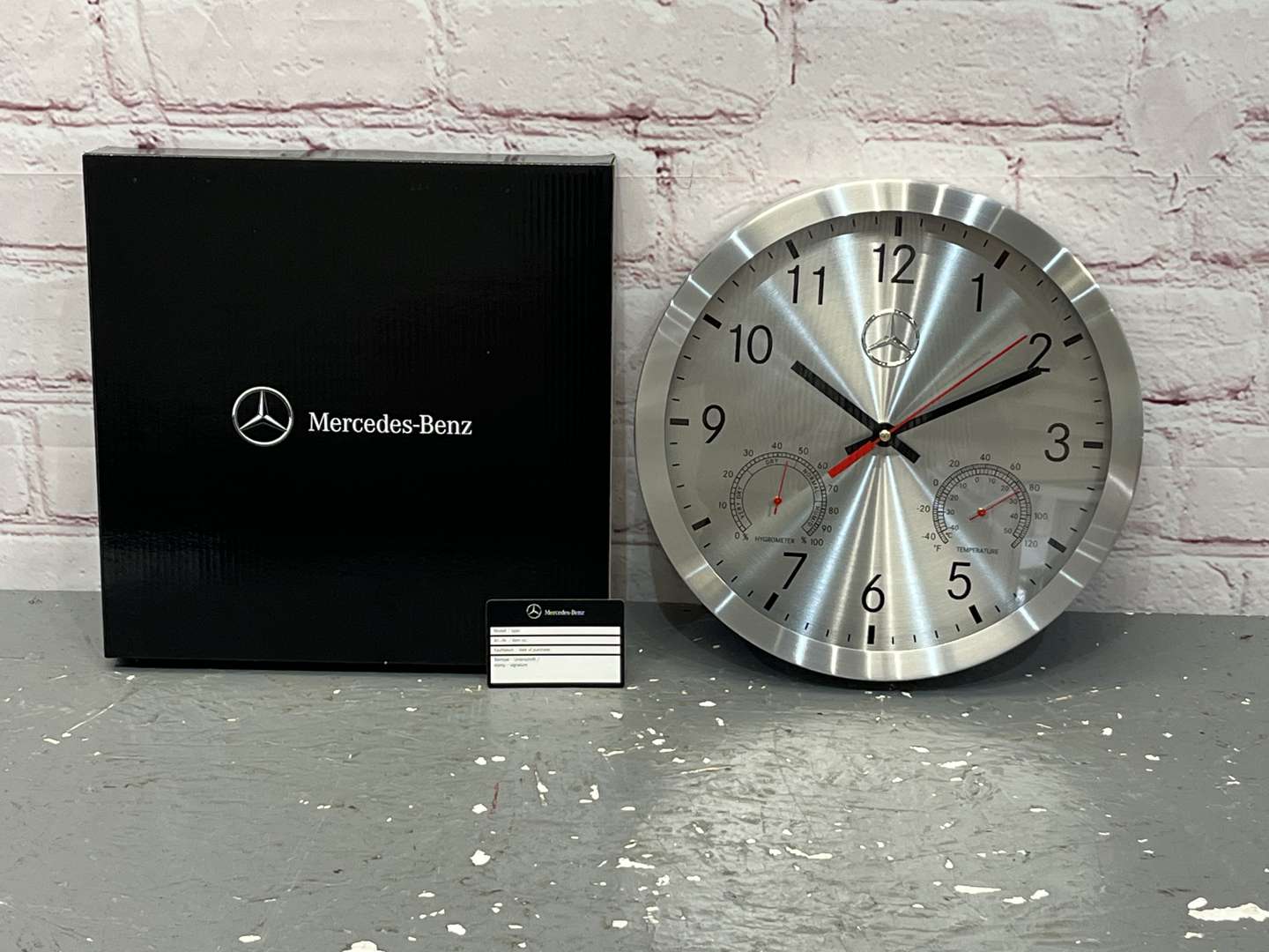<p>Mercedes Aluminium Genuine Dealership Boxed Wall Clock</p>