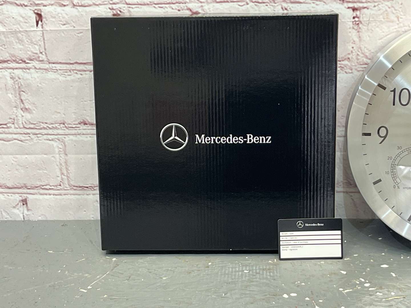 <p>Mercedes Aluminium Genuine Dealership Boxed Wall Clock</p>