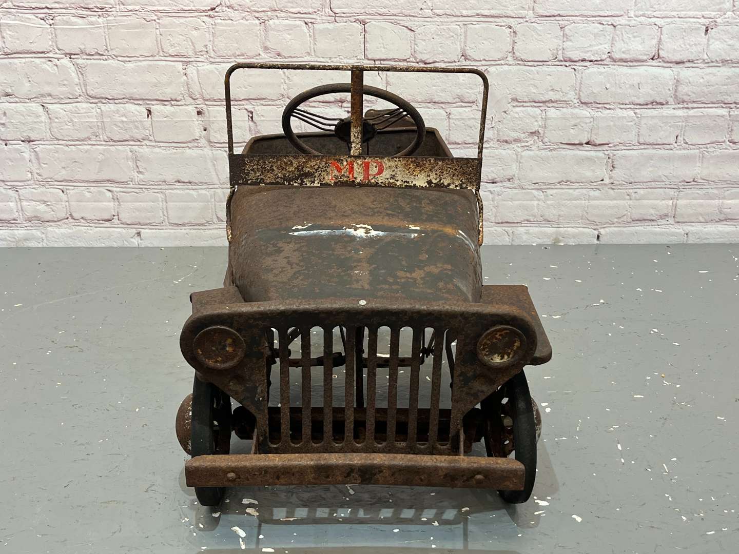 <p>Willy's Jeep Tin Plated Childs Pedal Car</p>
