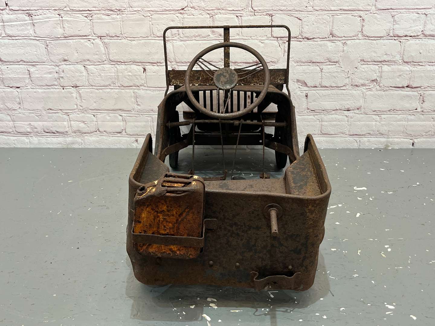 <p>Willy's Jeep Tin Plated Childs Pedal Car</p>