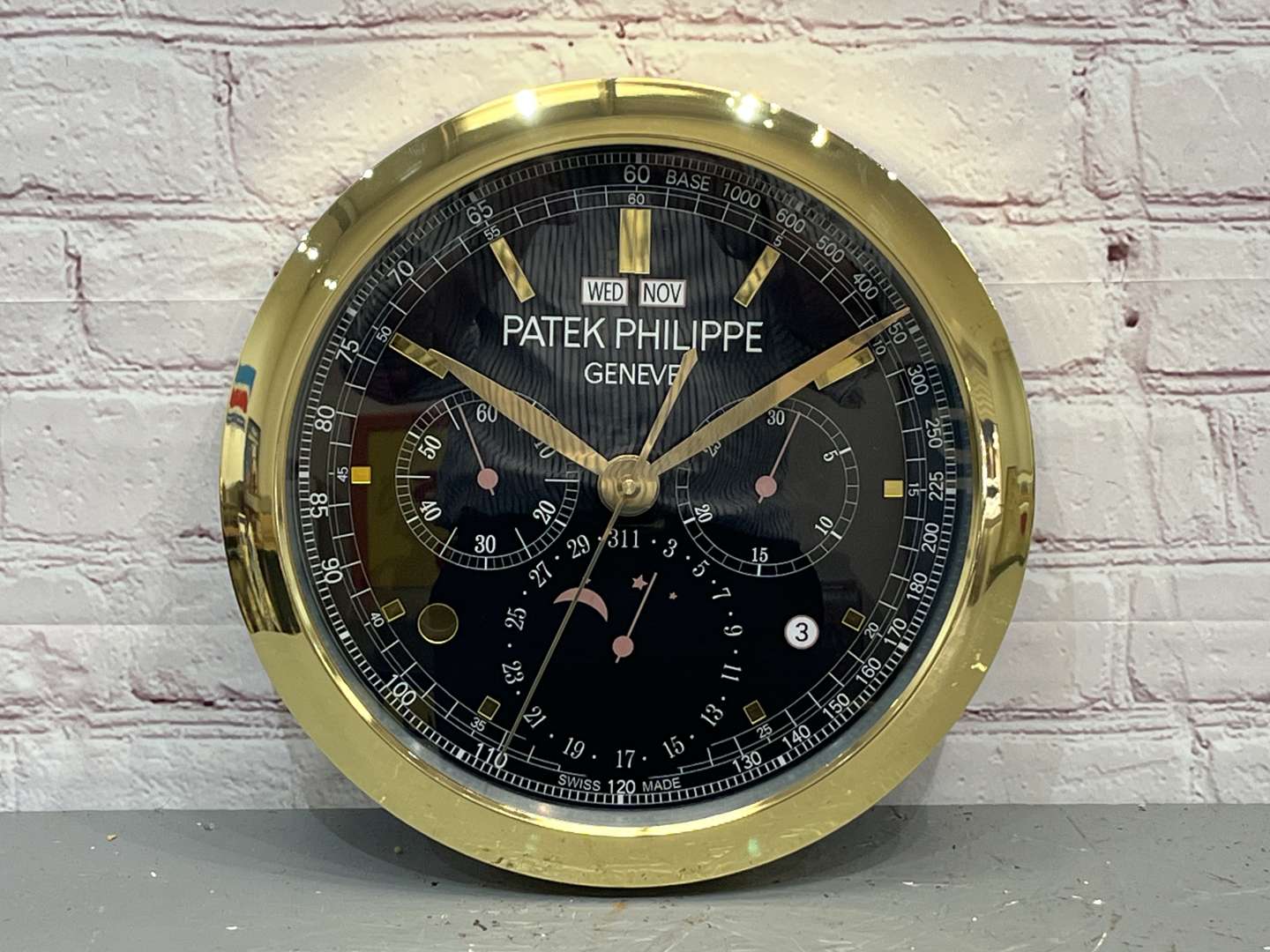 <p>Patek Philippe Modern Metal Wall Clock</p>