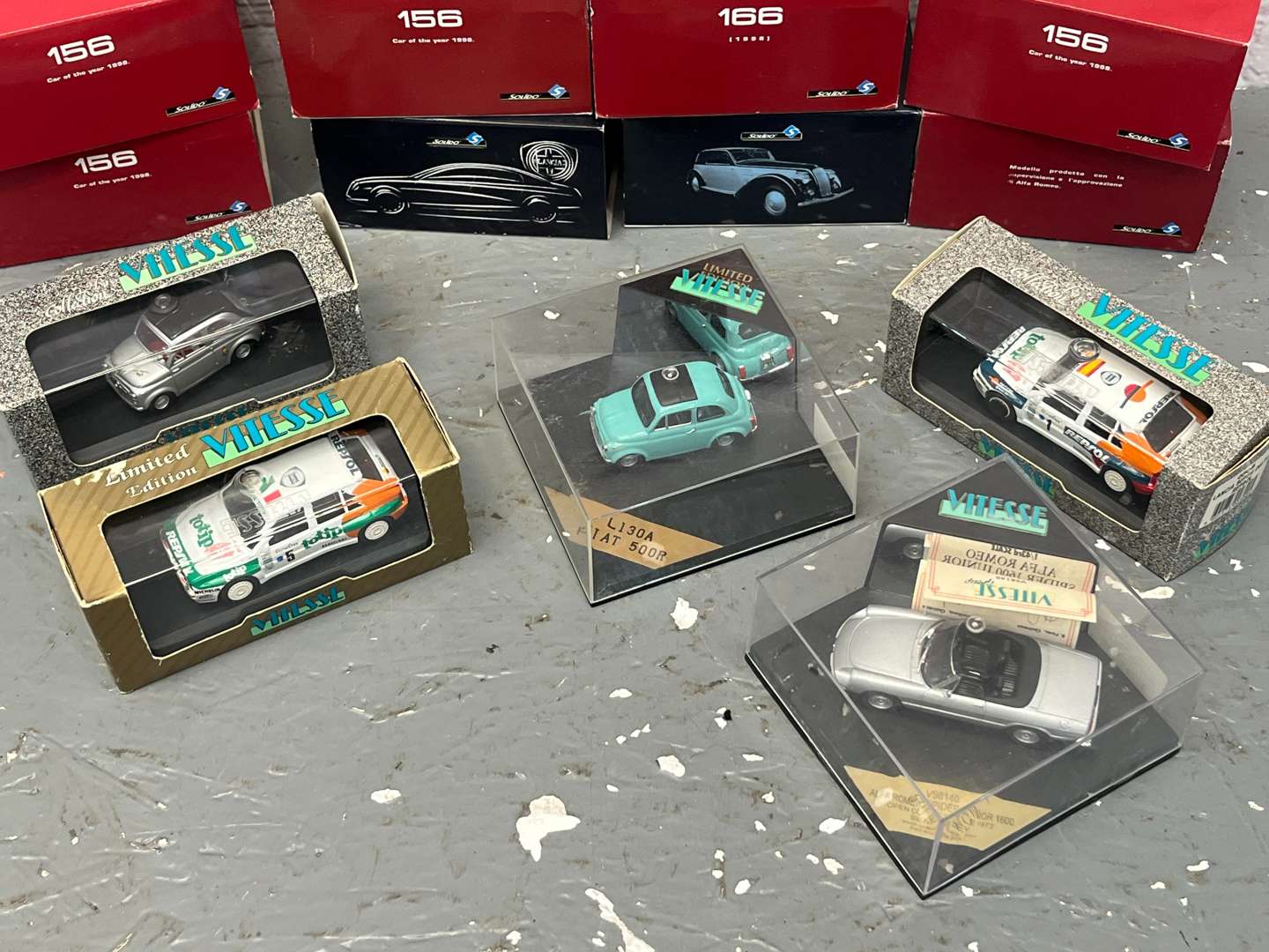 <p>Fourteen Boxed Diecast Model Cars&nbsp;</p>