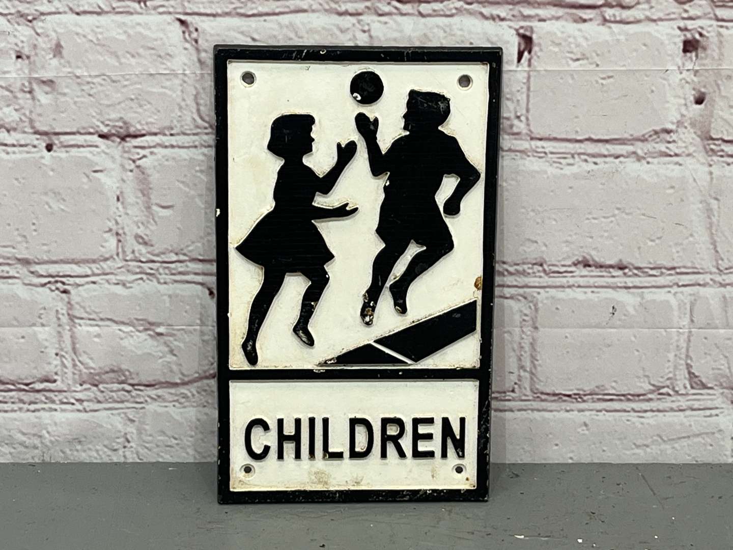 <p>Children Playing Cast Iron Sign</p>