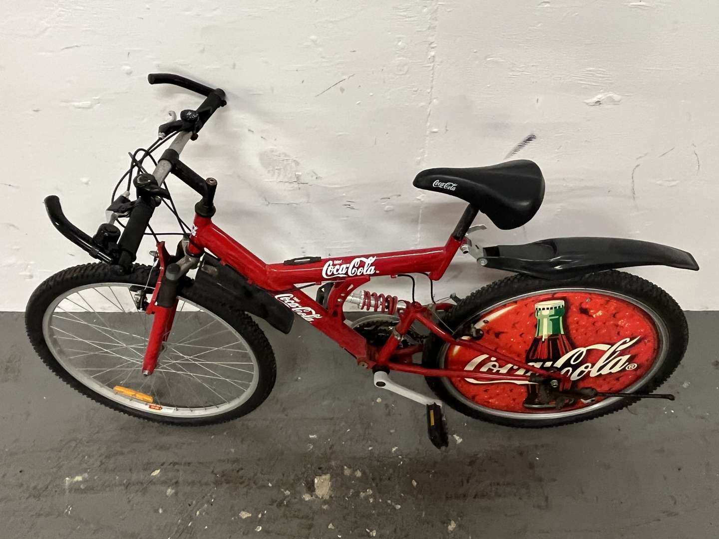 <p>Coca-Cola Liveried Limited Edition Mountain Bike</p>