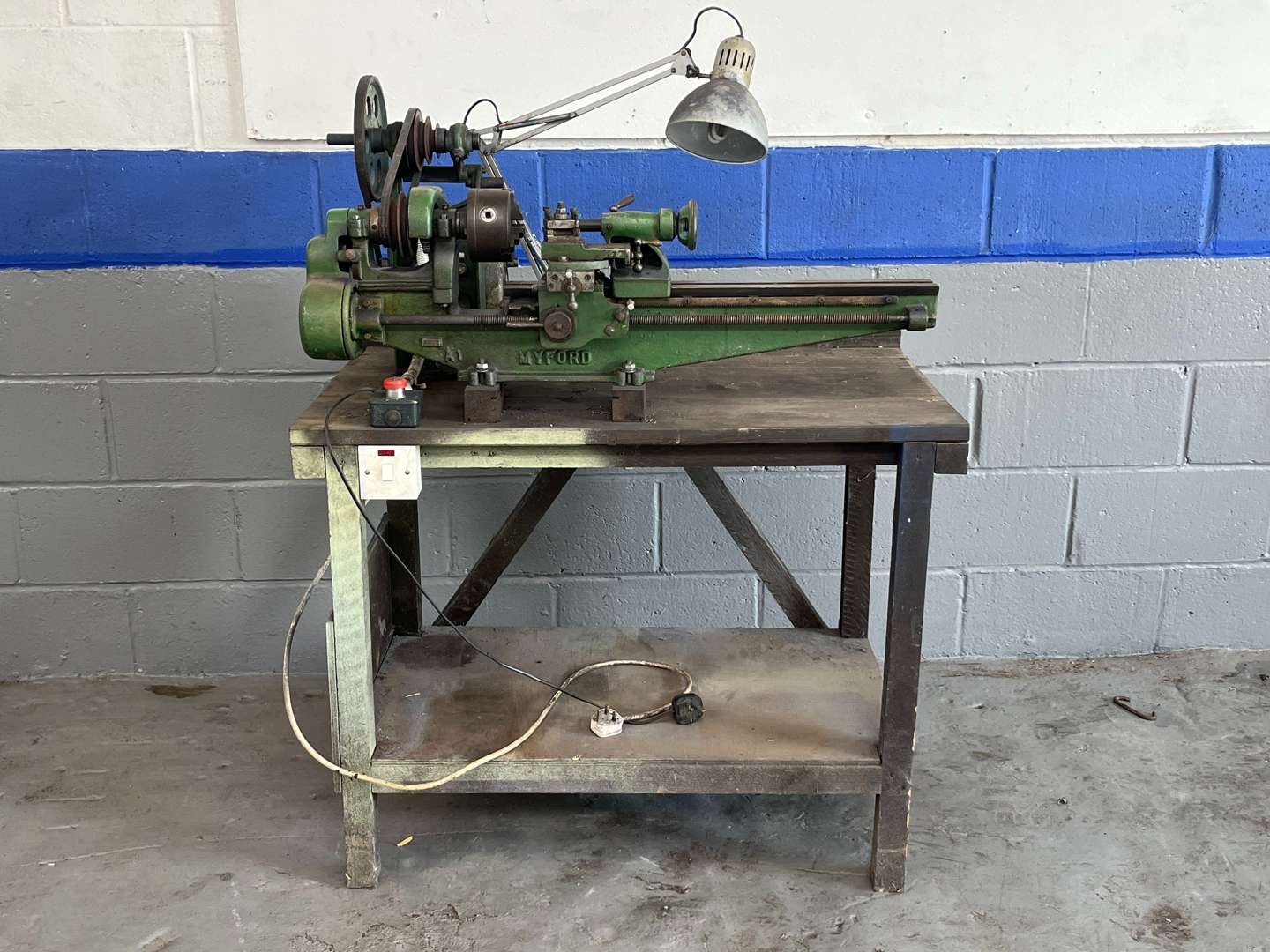 <p>Myford Metal Lathe Mounted on a Work Bench</p>