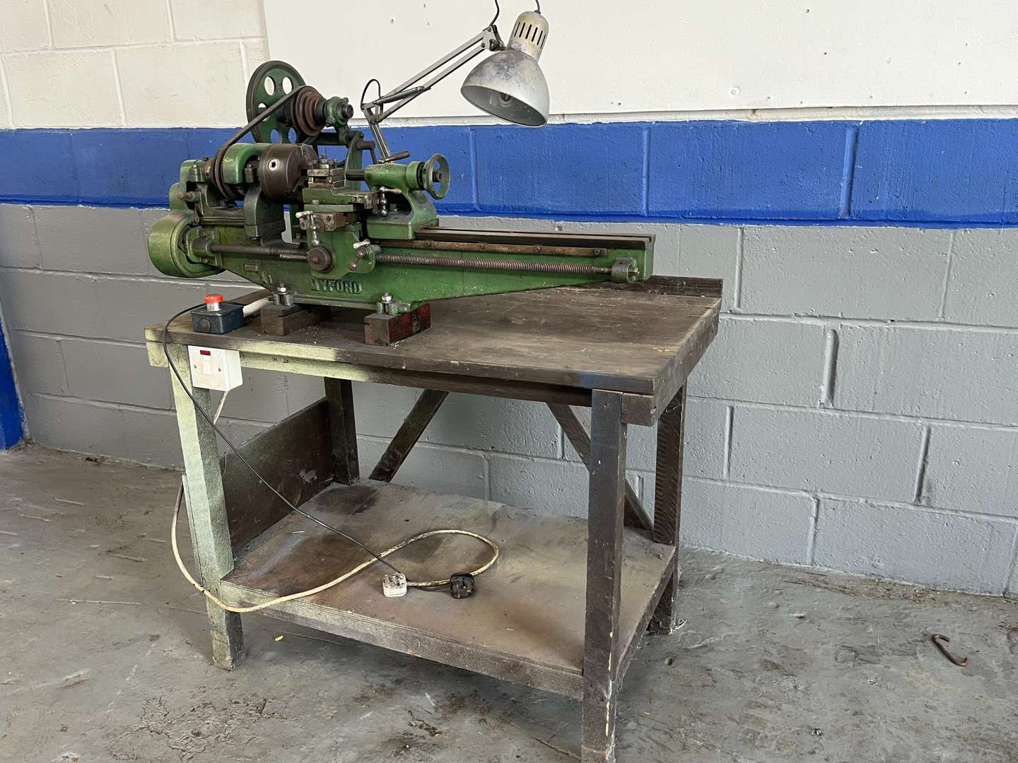 <p>Myford Metal Lathe Mounted on a Work Bench</p>