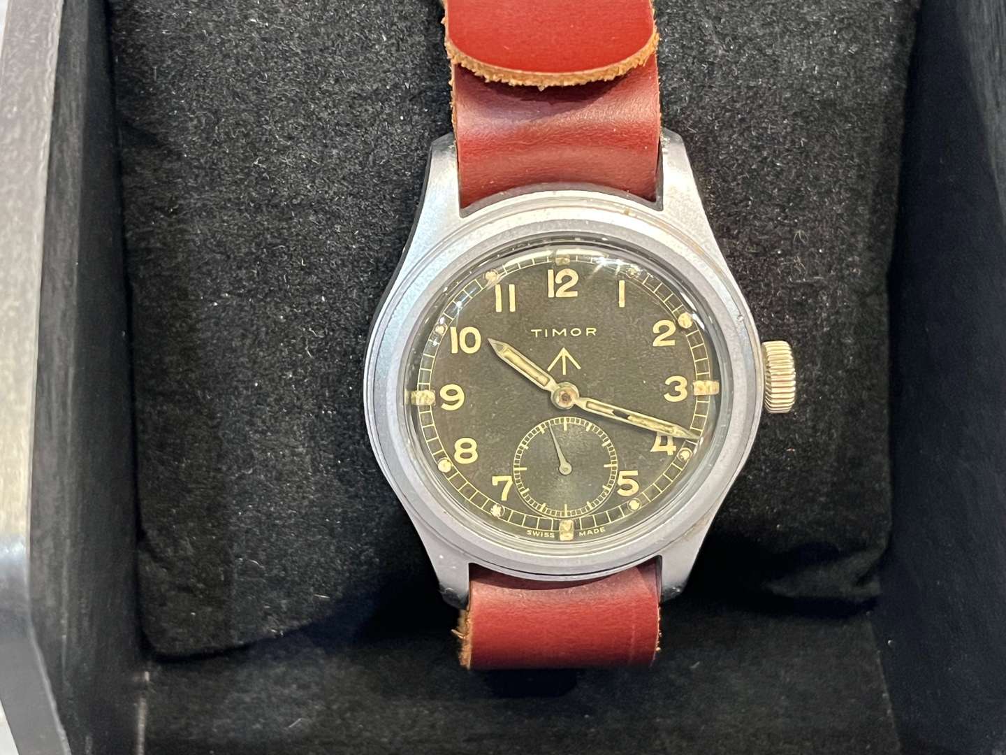 <p>Timor, WWII British Military “Dirty Dozen” Wrist Watch On a Leather Strap</p>