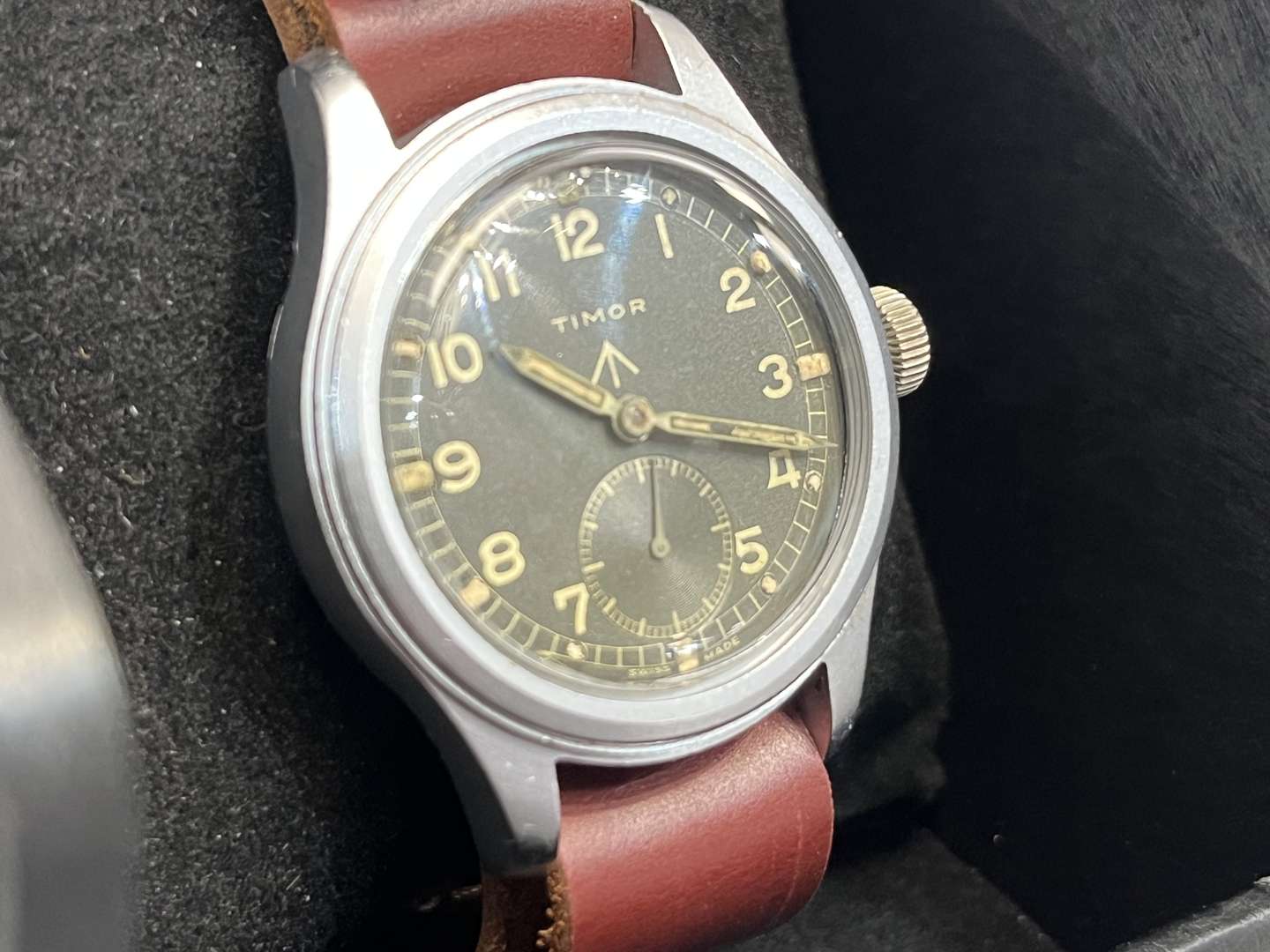 <p>Timor, WWII British Military “Dirty Dozen” Wrist Watch On a Leather Strap</p>