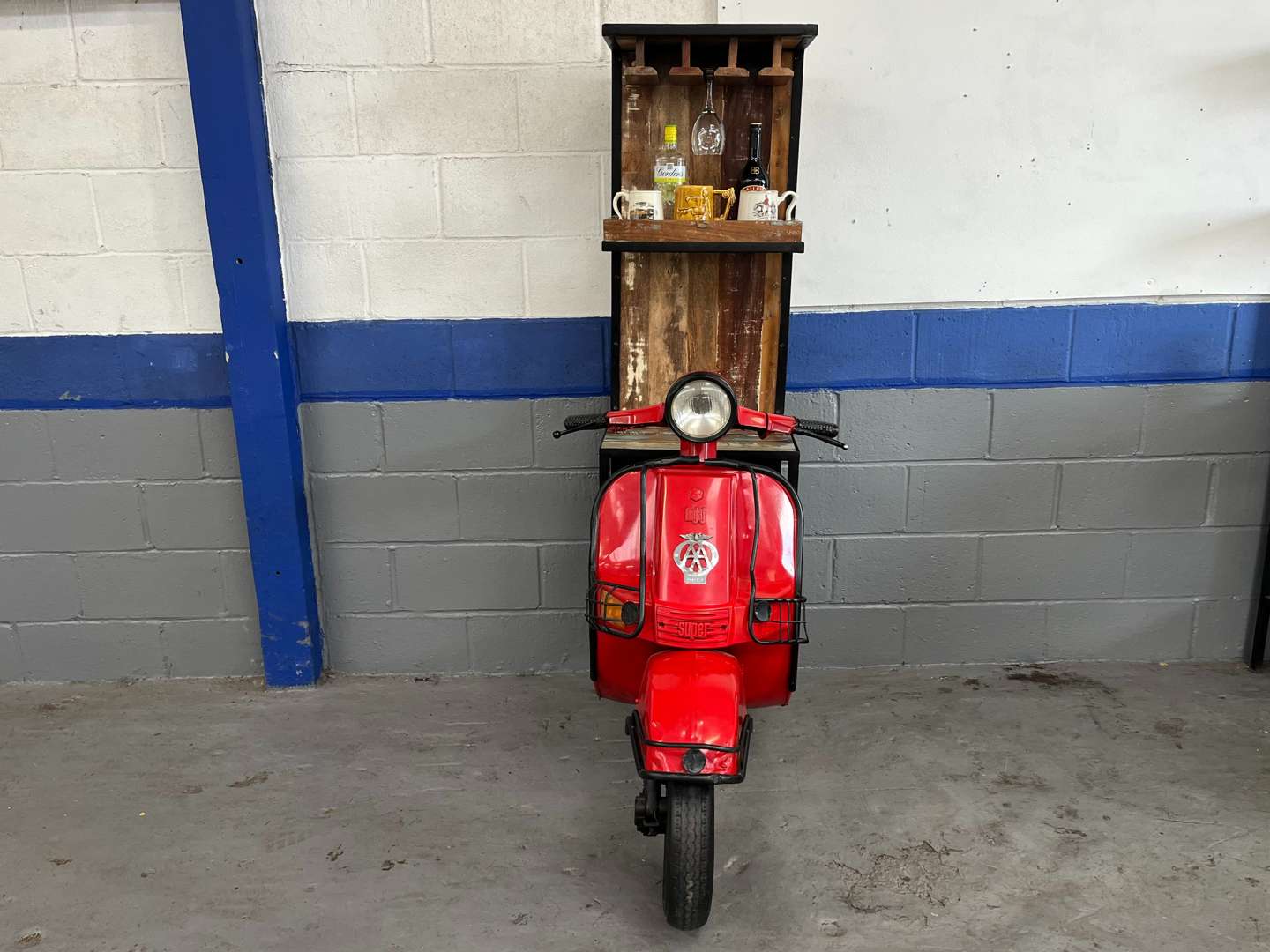 <p>Scooter Made Bar With Wine Holder & Two Open Shelves&nbsp;</p>