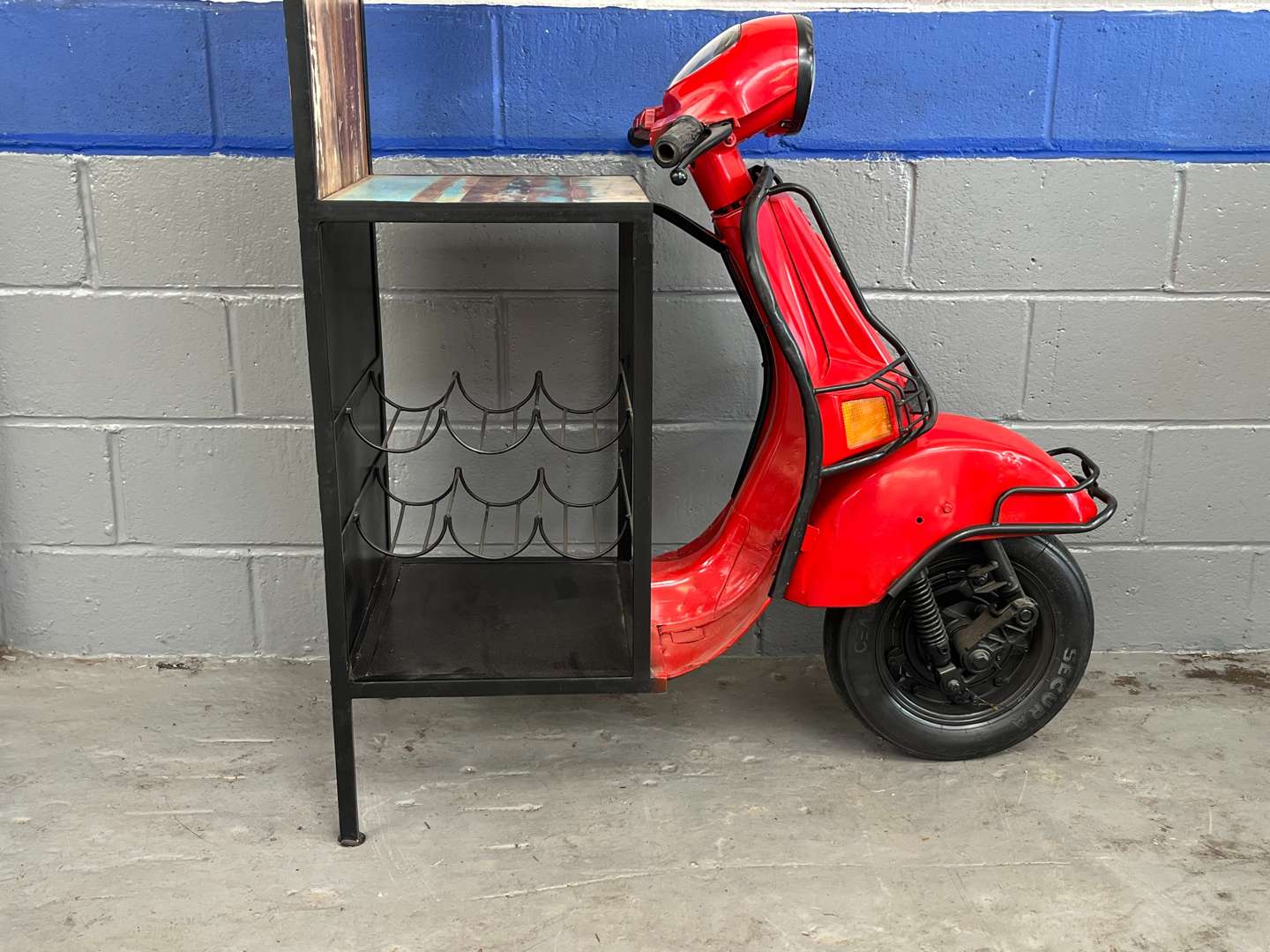 <p>Scooter Made Bar With Wine Holder & Two Open Shelves&nbsp;</p>