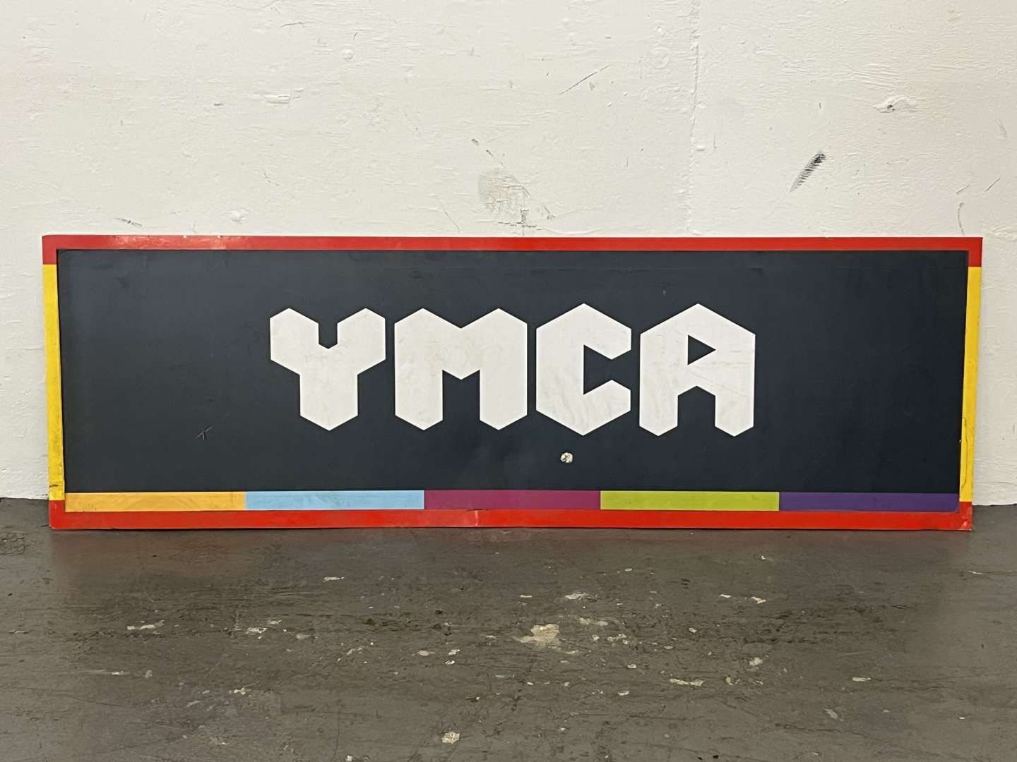 <p>YMCA Sign on Metal Board</p>
