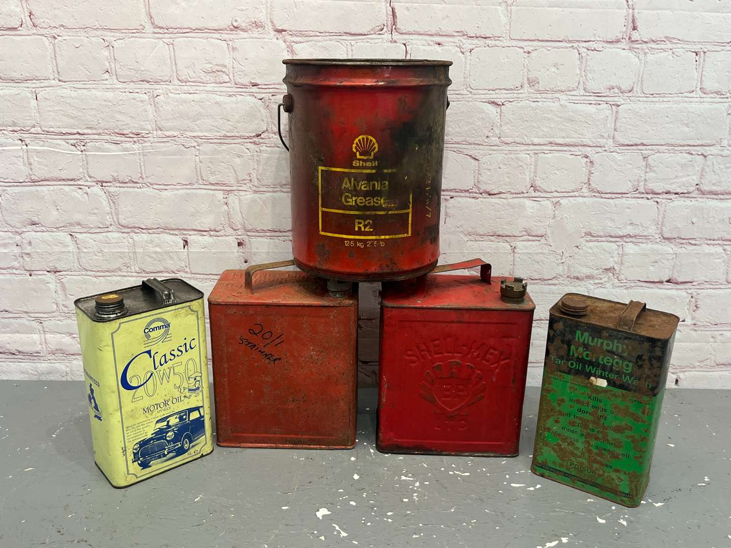 <p>Mixed Lot of Five Oil/Grease & Two Five Gallon Fuel Cans (5)</p>