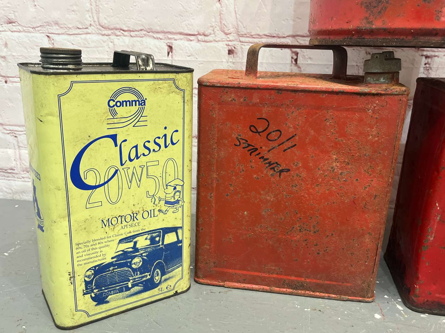 <p>Mixed Lot of Five Oil/Grease & Two Five Gallon Fuel Cans (5)</p>