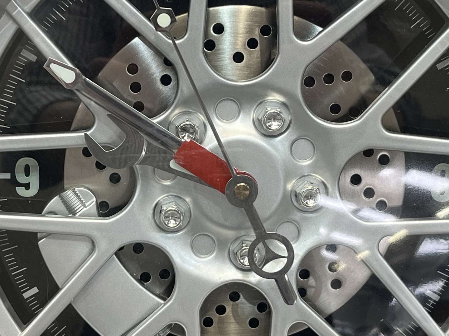 <p>Wall Clock in The Form of a Wheel</p>